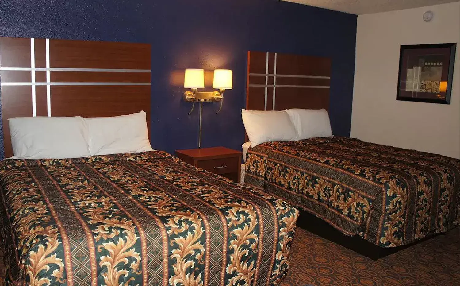 Bed in Coratel Inn & Suites by Jasper Waite Park