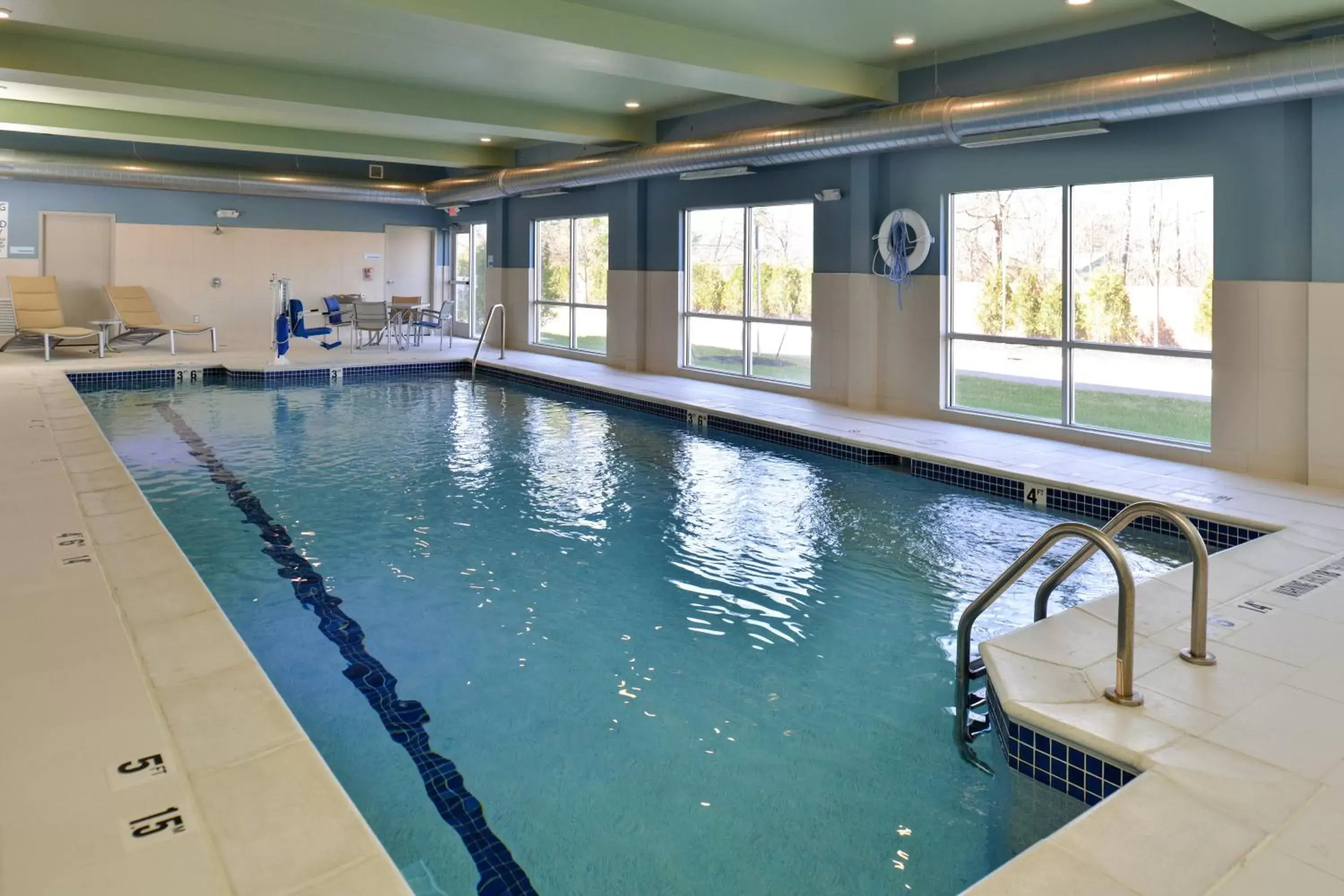 Swimming Pool in Holiday Inn Express & Suites Farmington Hills - Detroit, an IHG Hotel