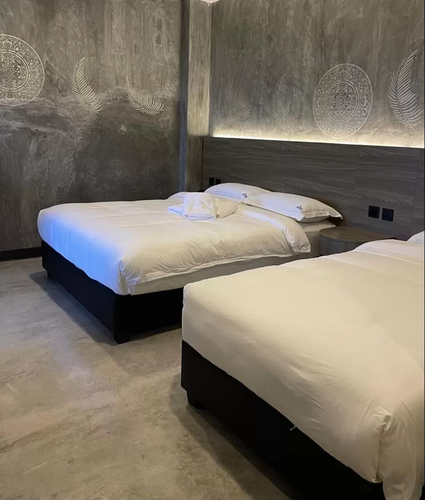 Bed in Sri Indar Hotel & Suites