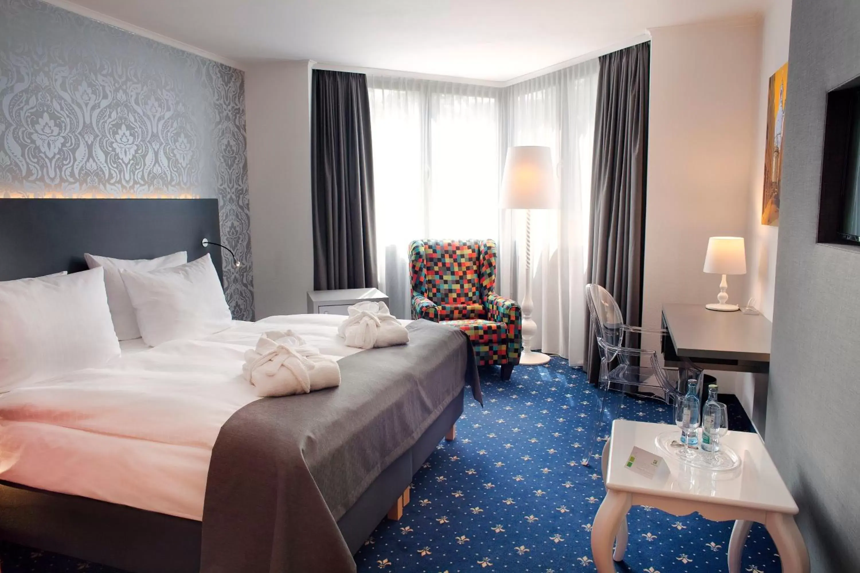 Photo of the whole room, Bed in Holiday Inn Dresden - City South, an IHG Hotel