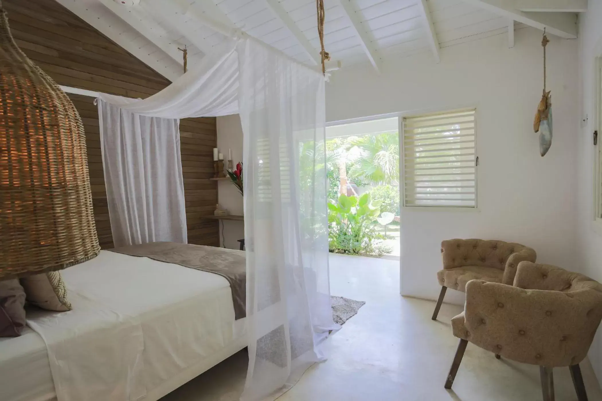 Bed in Mahona Boutique Hotel