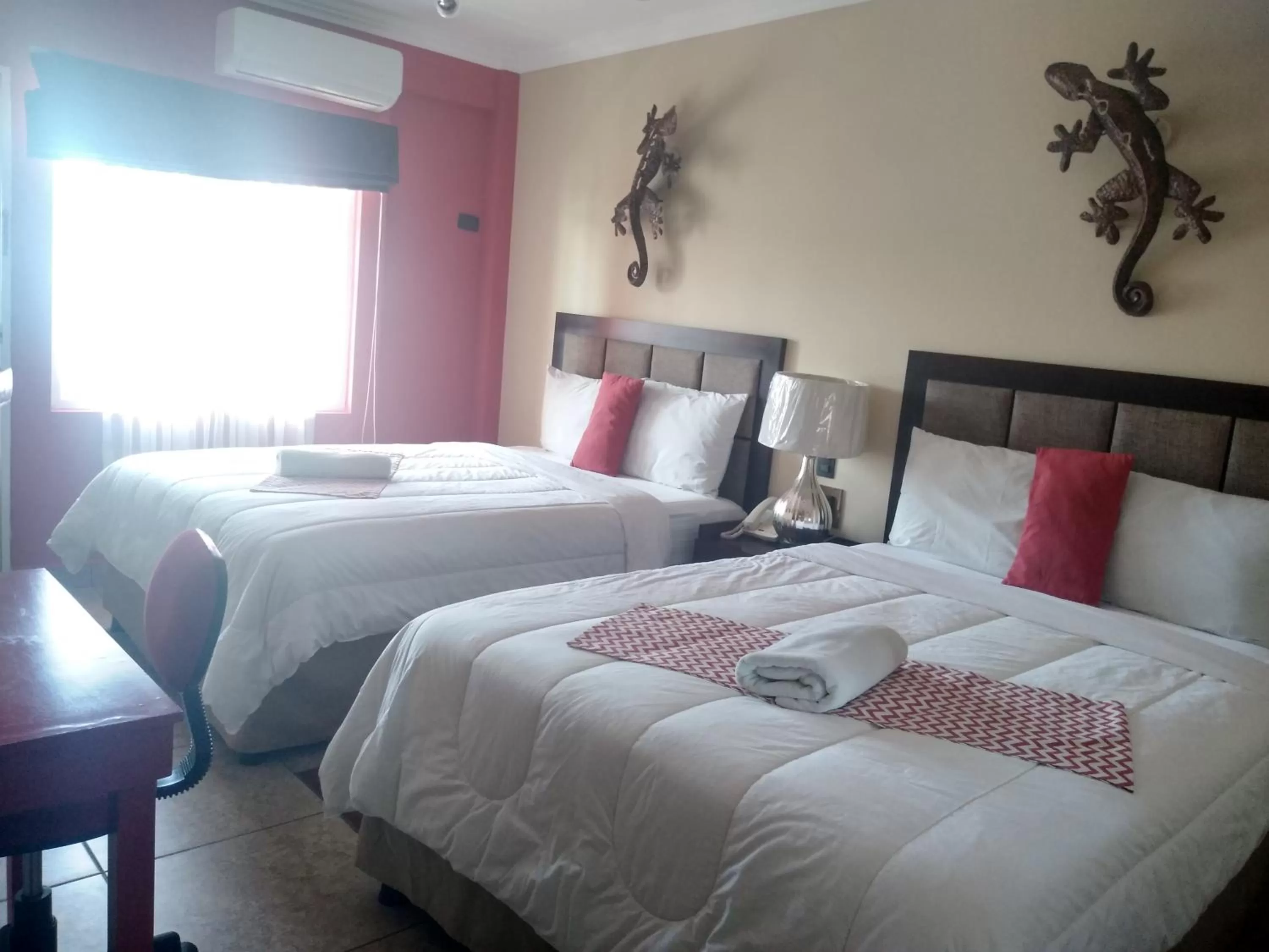 Photo of the whole room, Bed in Ramada by Wyndham Tikal Isla de Flores