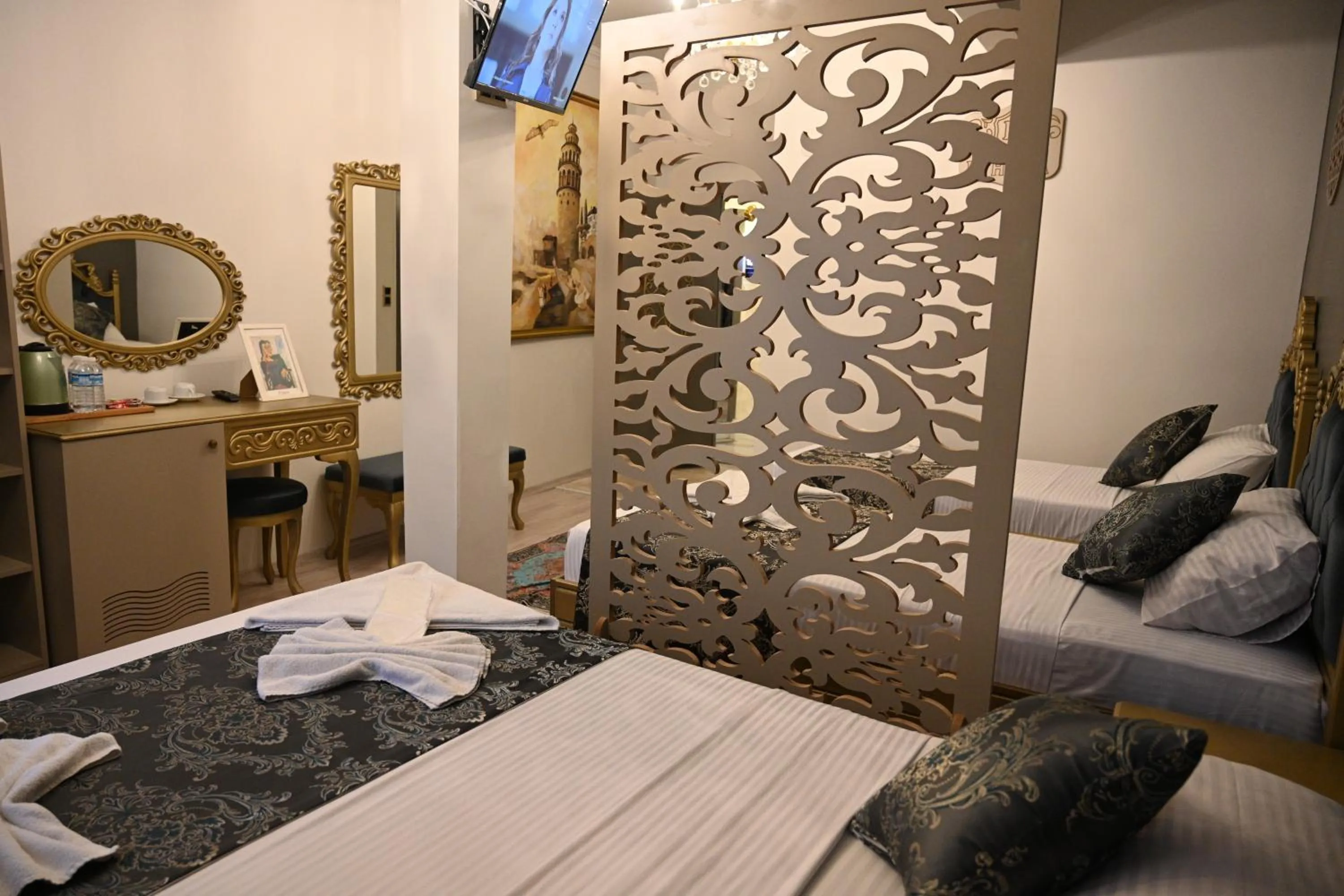 Bed in Ethnica Suites