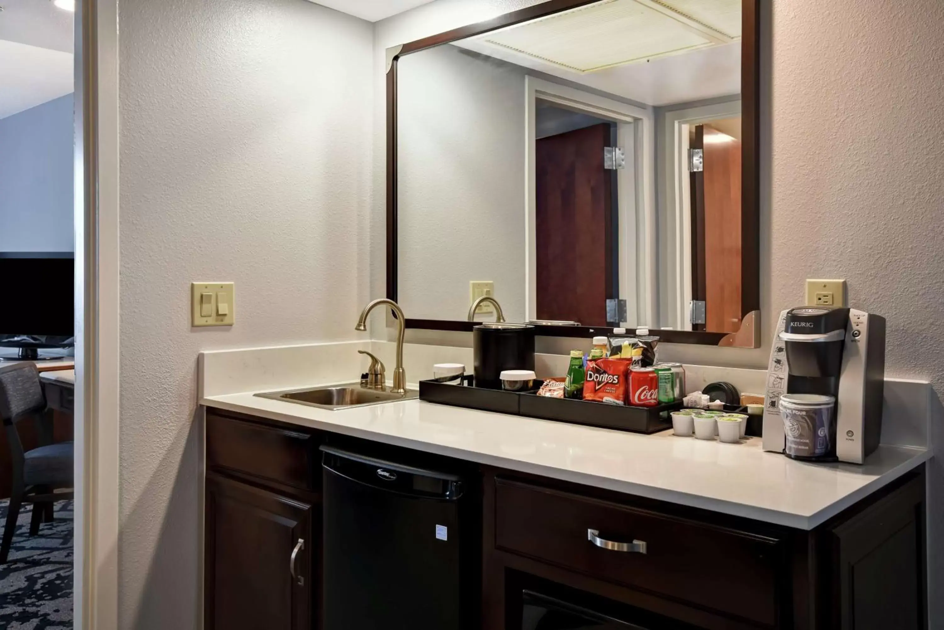 Photo of the whole room, Kitchen/Kitchenette in Embassy Suites Montgomery - Hotel & Conference Center