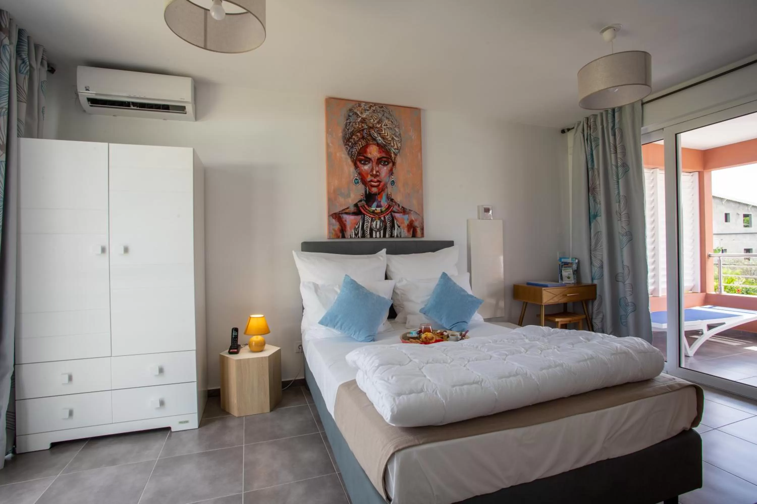 Bed in Hôtel Guadeloupe Palm Suites