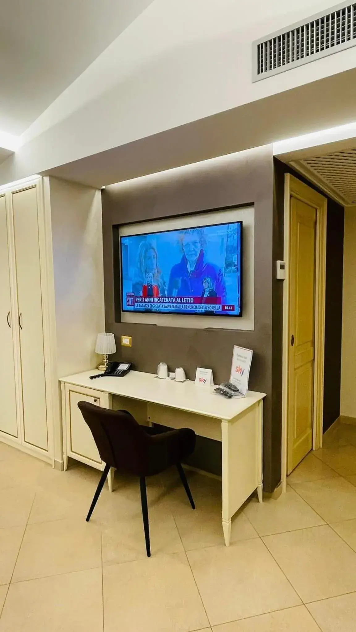 TV/Entertainment Center in Vittorio Emanuele Boutique Hotel