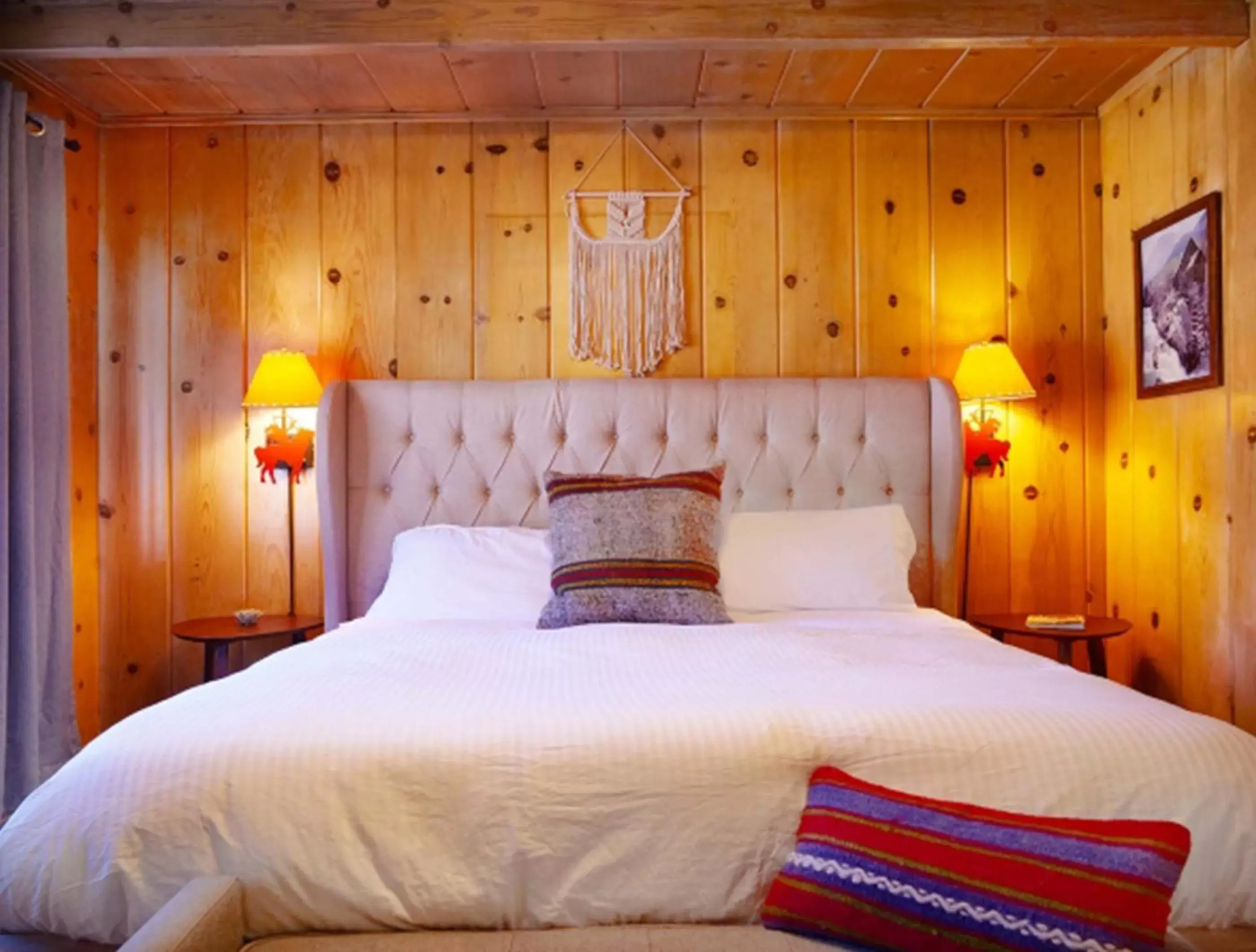 Bed in Grand Pine Cabins