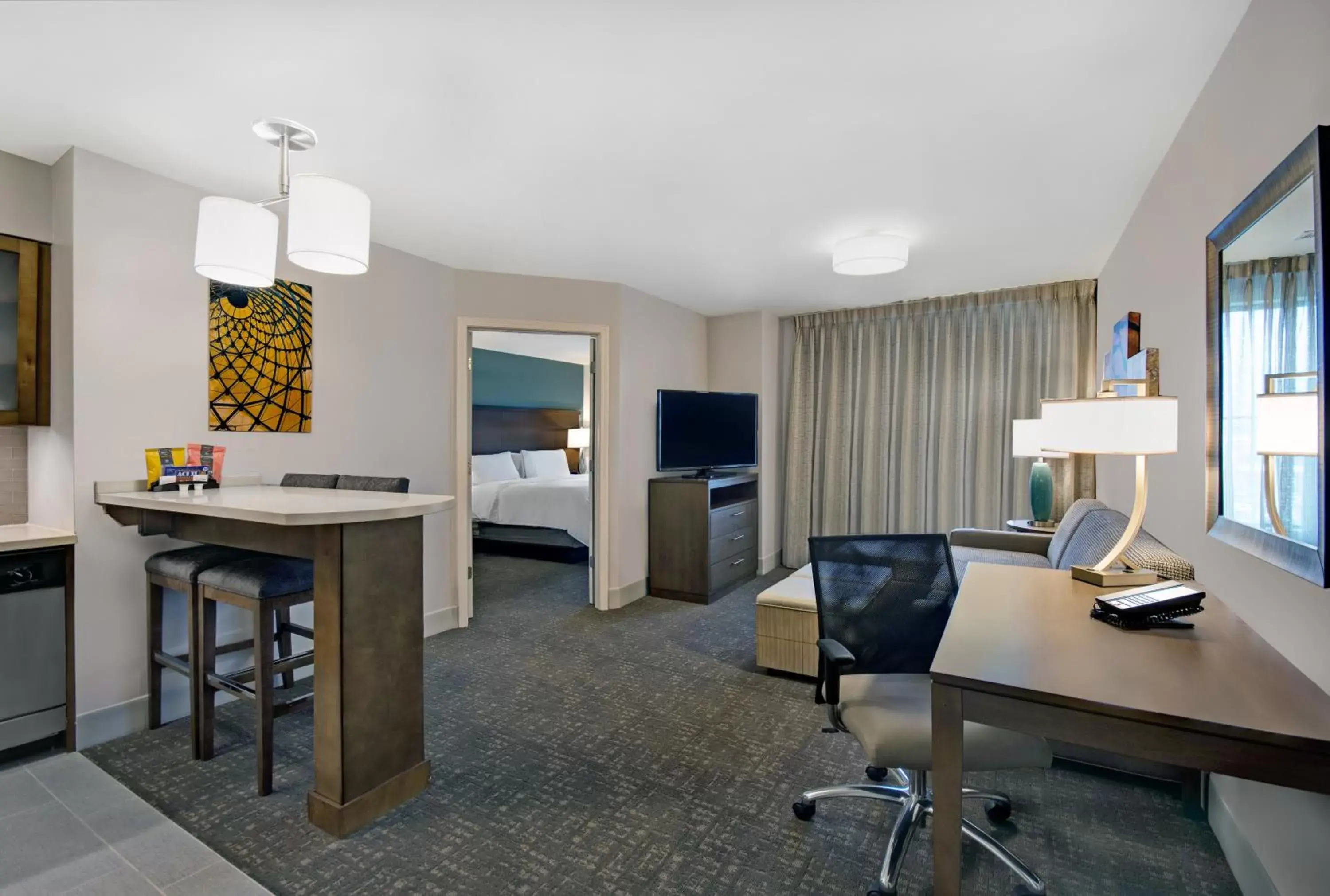 Photo of the whole room, TV/Entertainment Center in Staybridge Suites - Sterling Heights -Detroit Area, an IHG Hotel