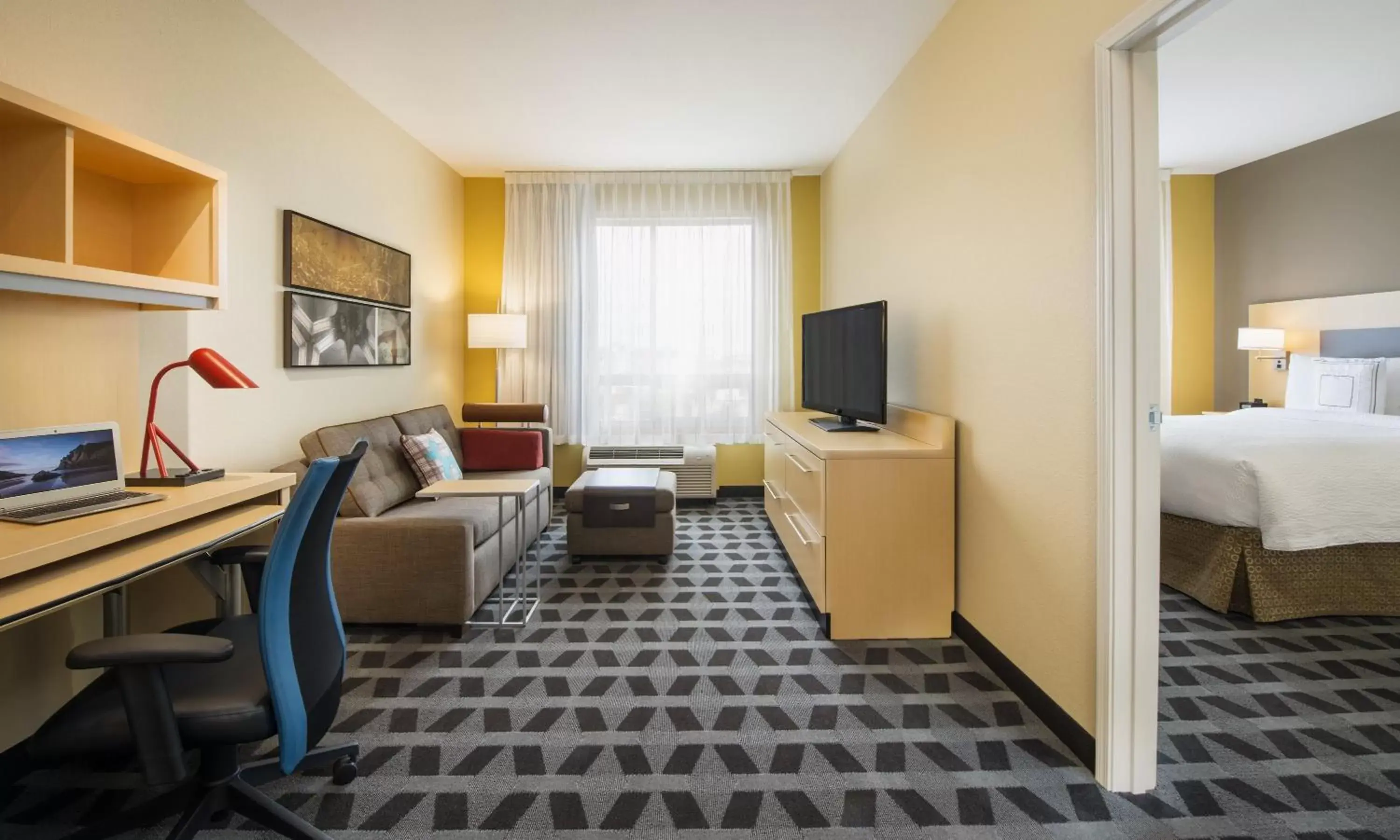 Photo of the whole room, TV/Entertainment Center in TownePlace Suites by Marriott Red Deer