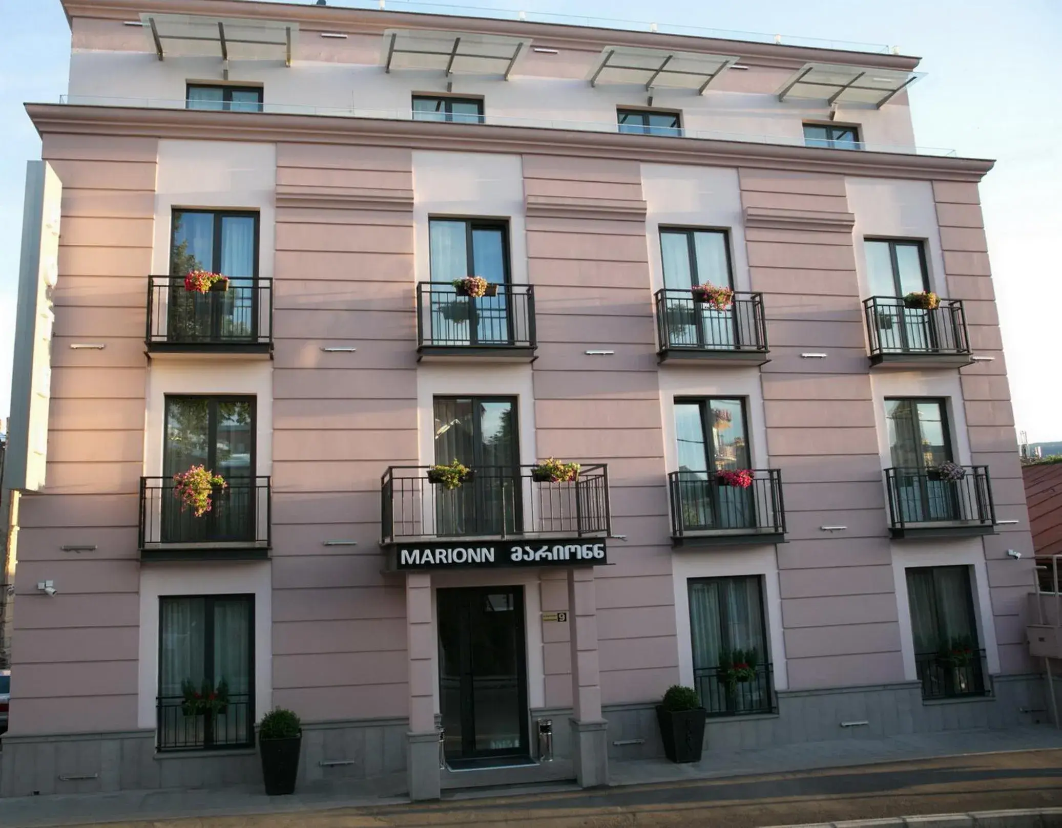 Patio, Property Building in Marionn Hotel