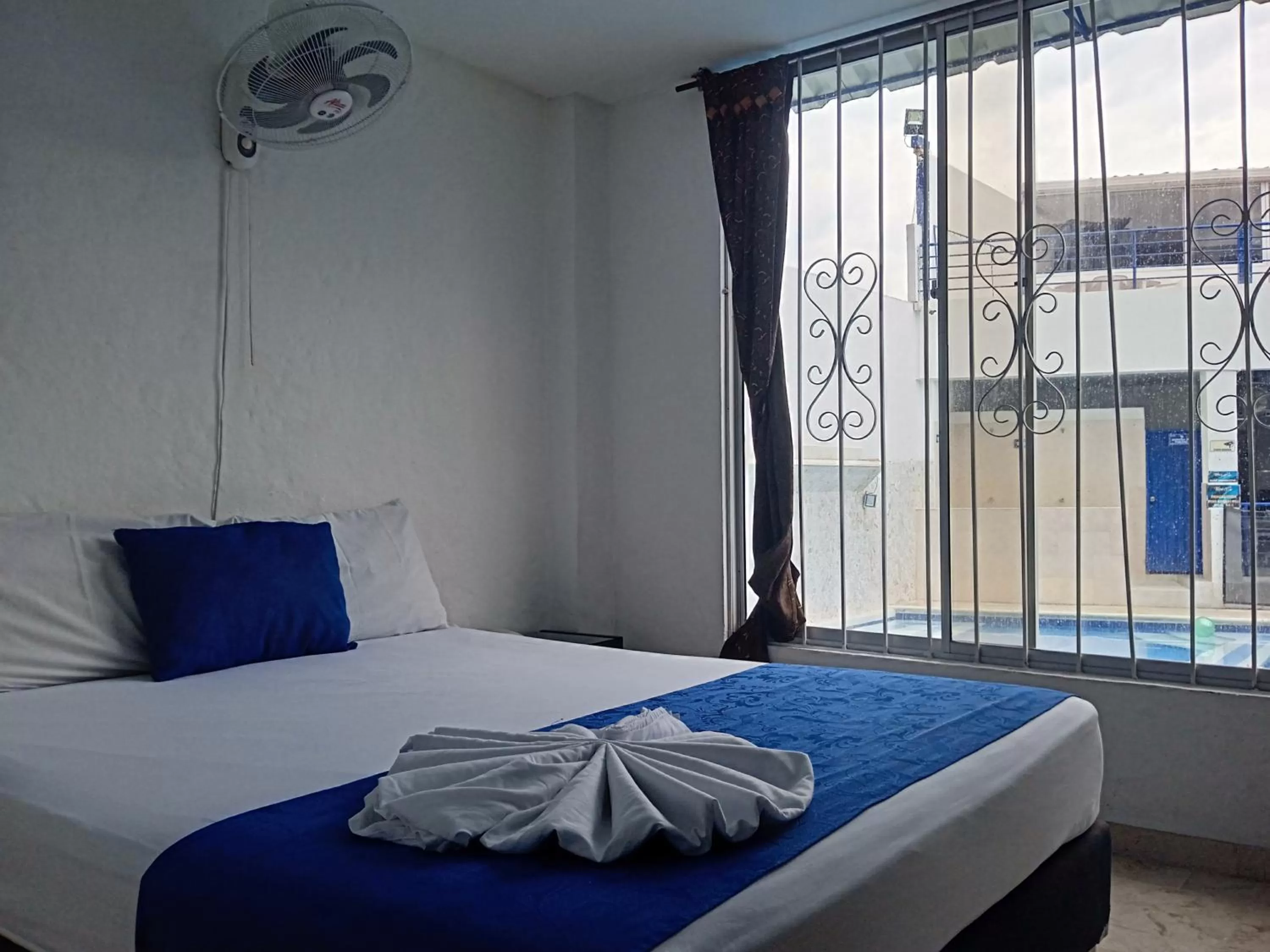 Bed in Blue Star Hotel