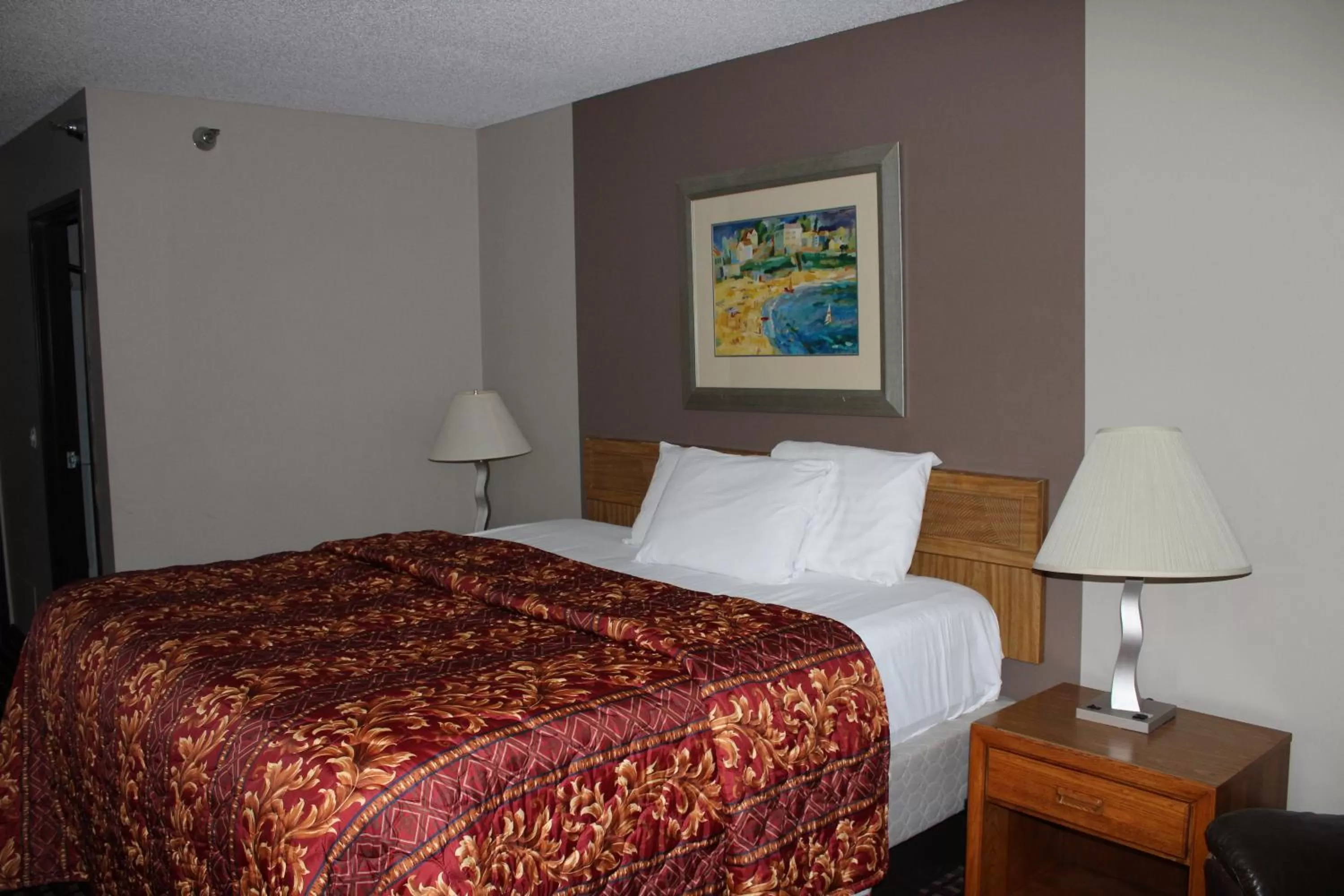 Bedroom, Bed in Coratel Inn and Suites Maple Grove