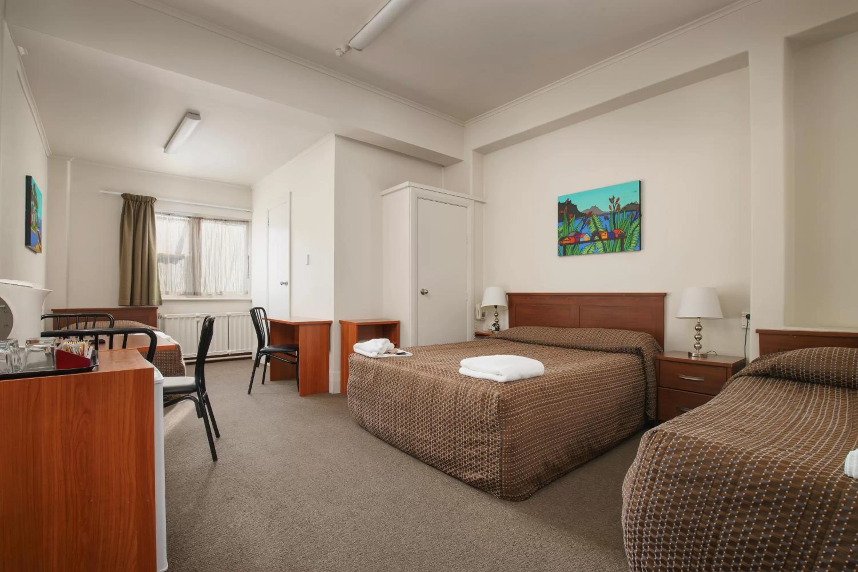 Guests, Bed in Kiwi International Hotel