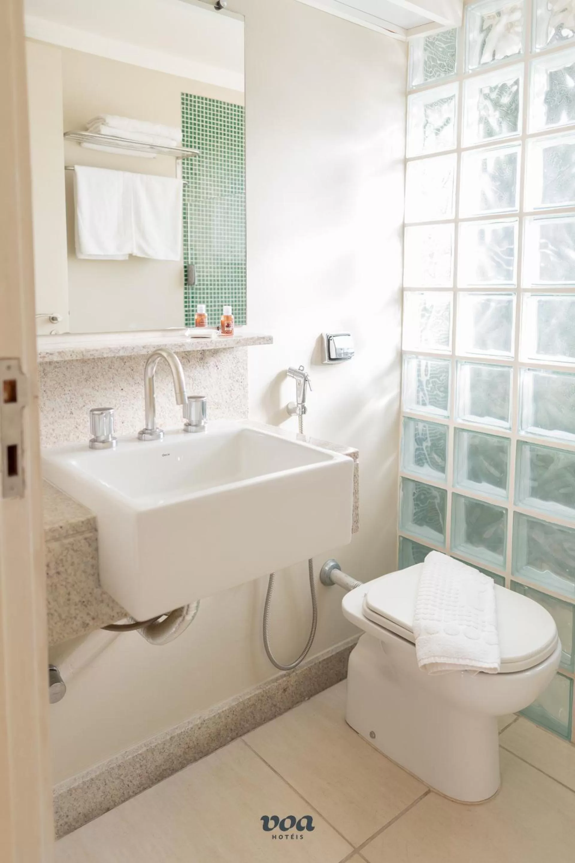 Toilet in VOA Plazza Hotel