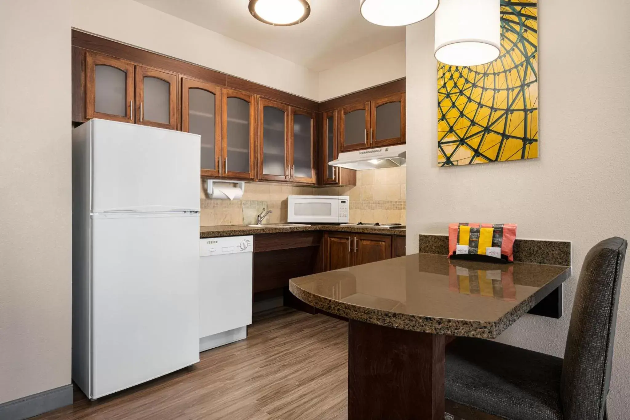 Photo of the whole room, Kitchen/Kitchenette in Staybridge Suites Oklahoma City-Quail Springs, an IHG Hotel