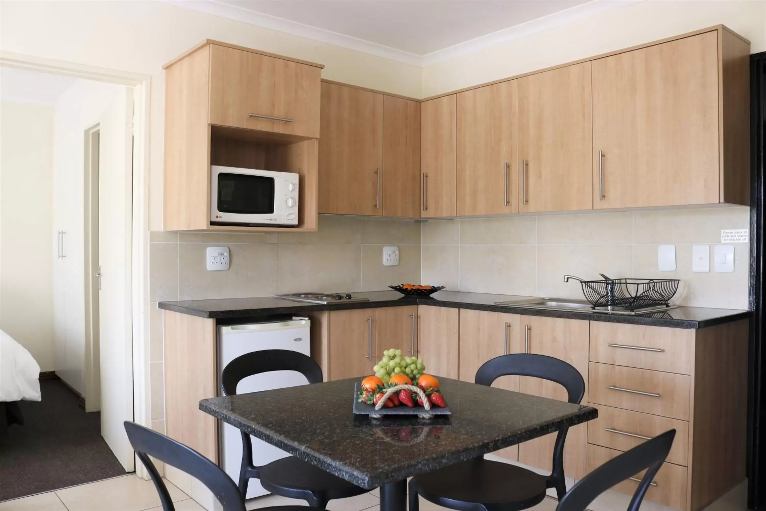 Kitchen or kitchenette, Dining Area in Premiere Classe Apartment Hotel