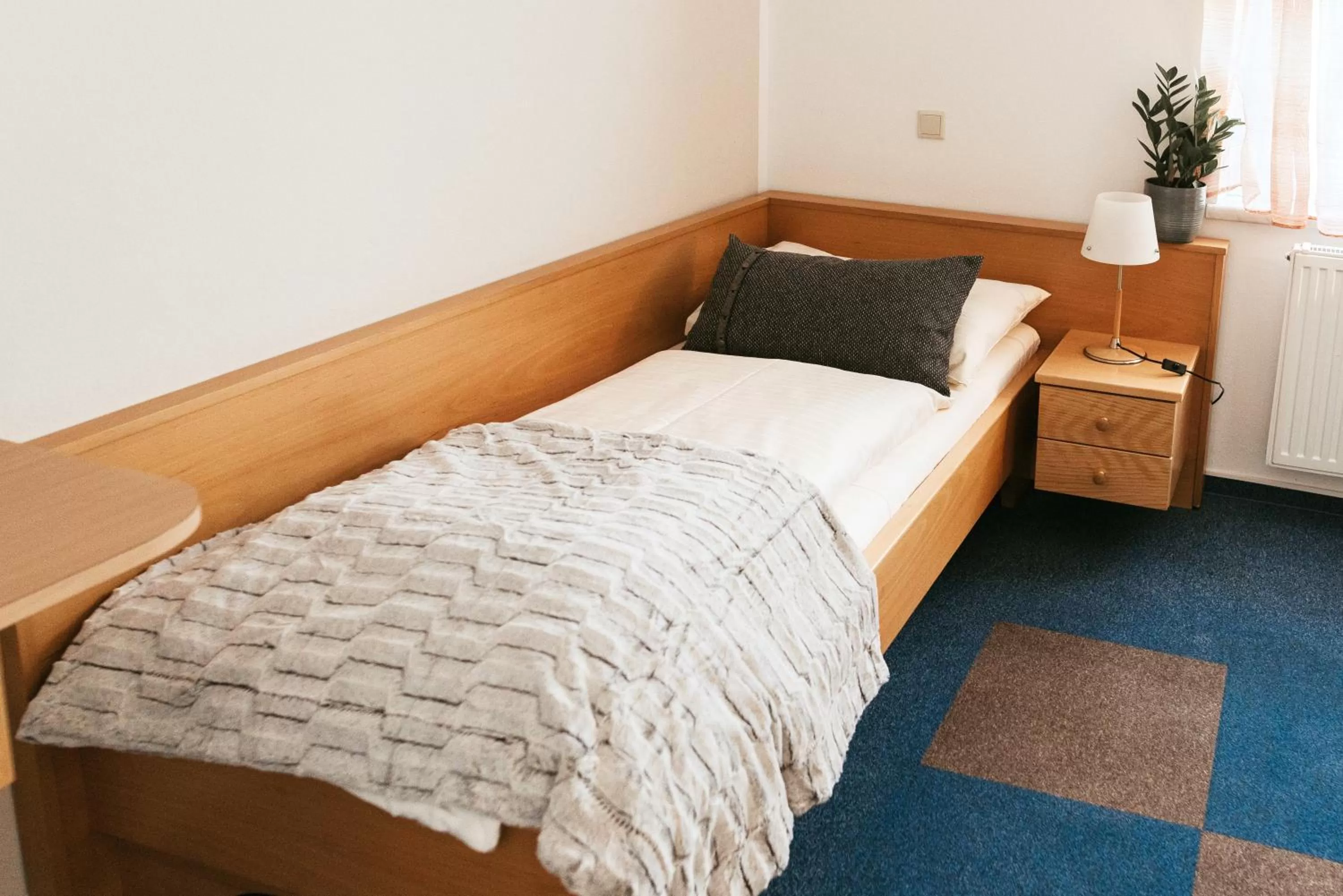 Bed in Restaurant Gästehaus Feldkirchen