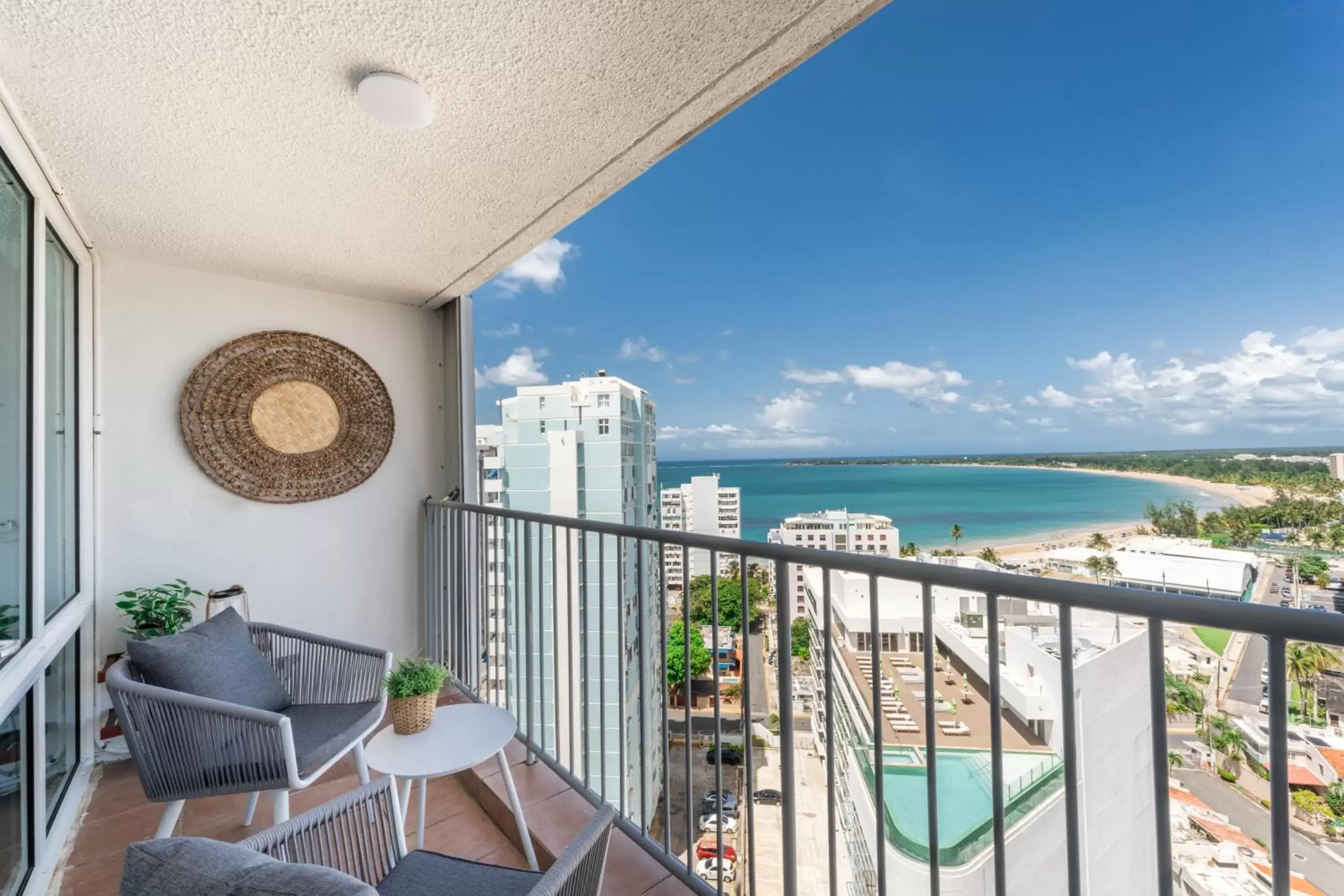 Patio in OCEAN VIEW DELUXE SUITE: PVT. BEACH & POOL