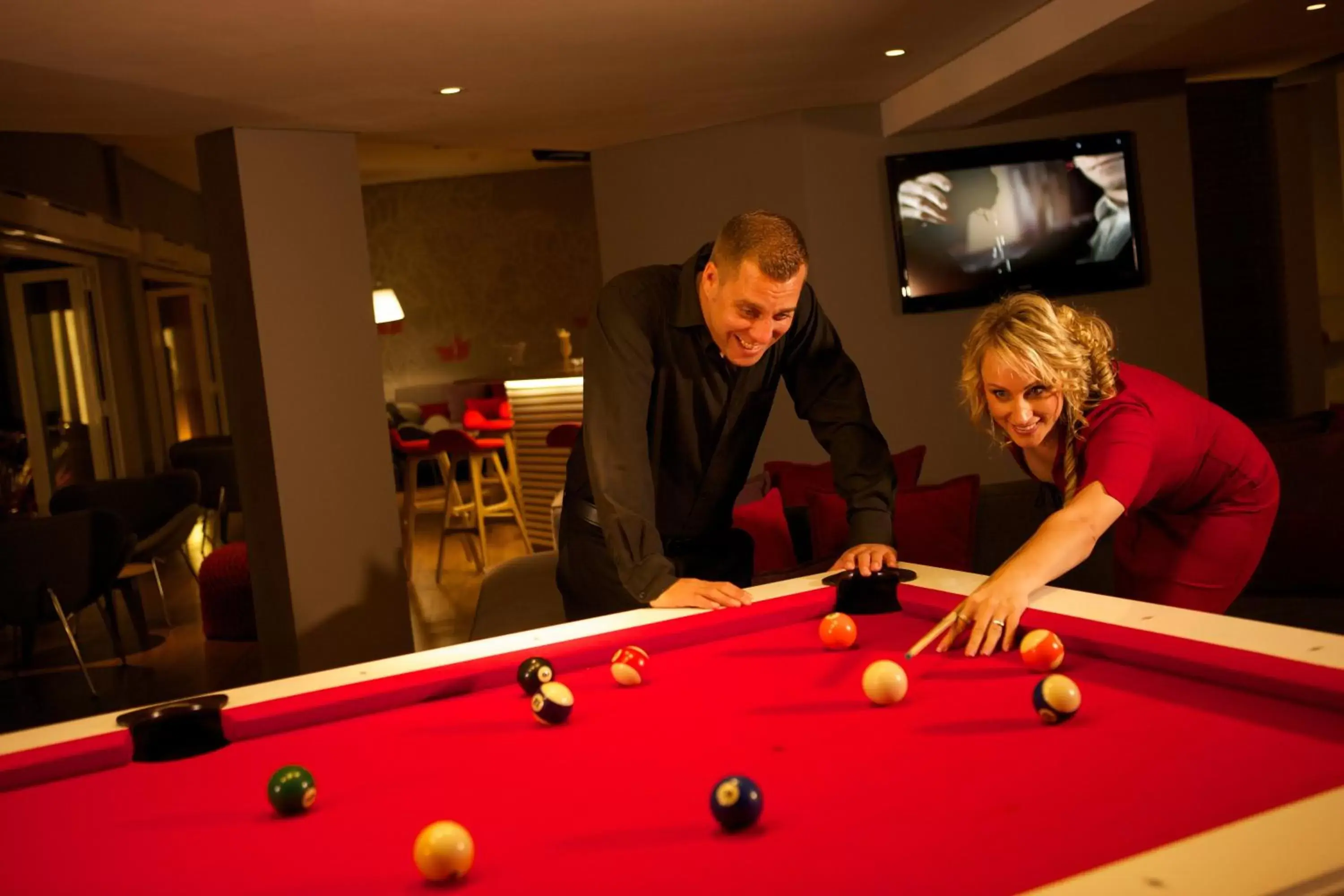 Communal lounge/ TV room, Billiards in The Address Boutique Hotel