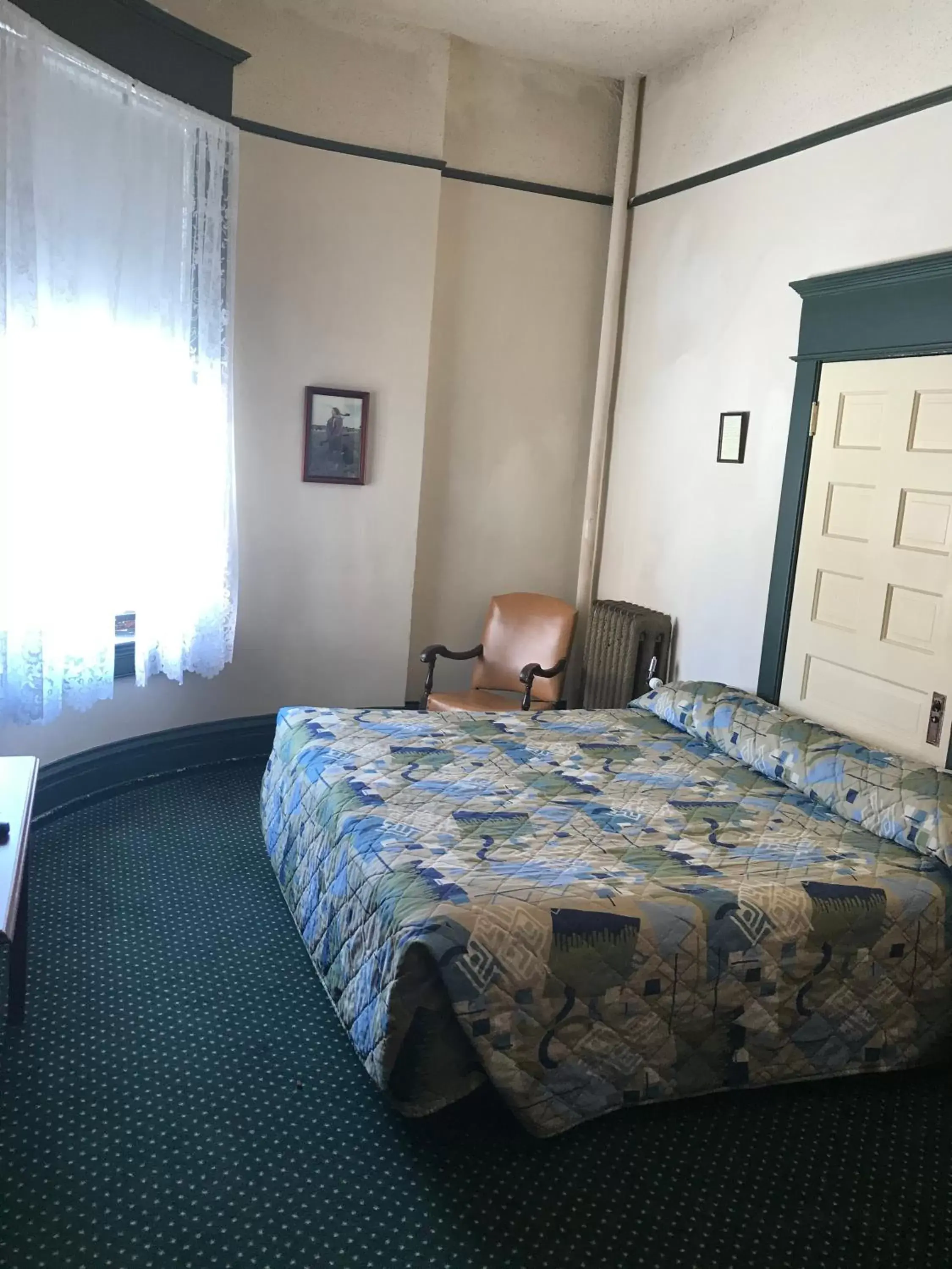 Bed in Historic Franklin Hotel