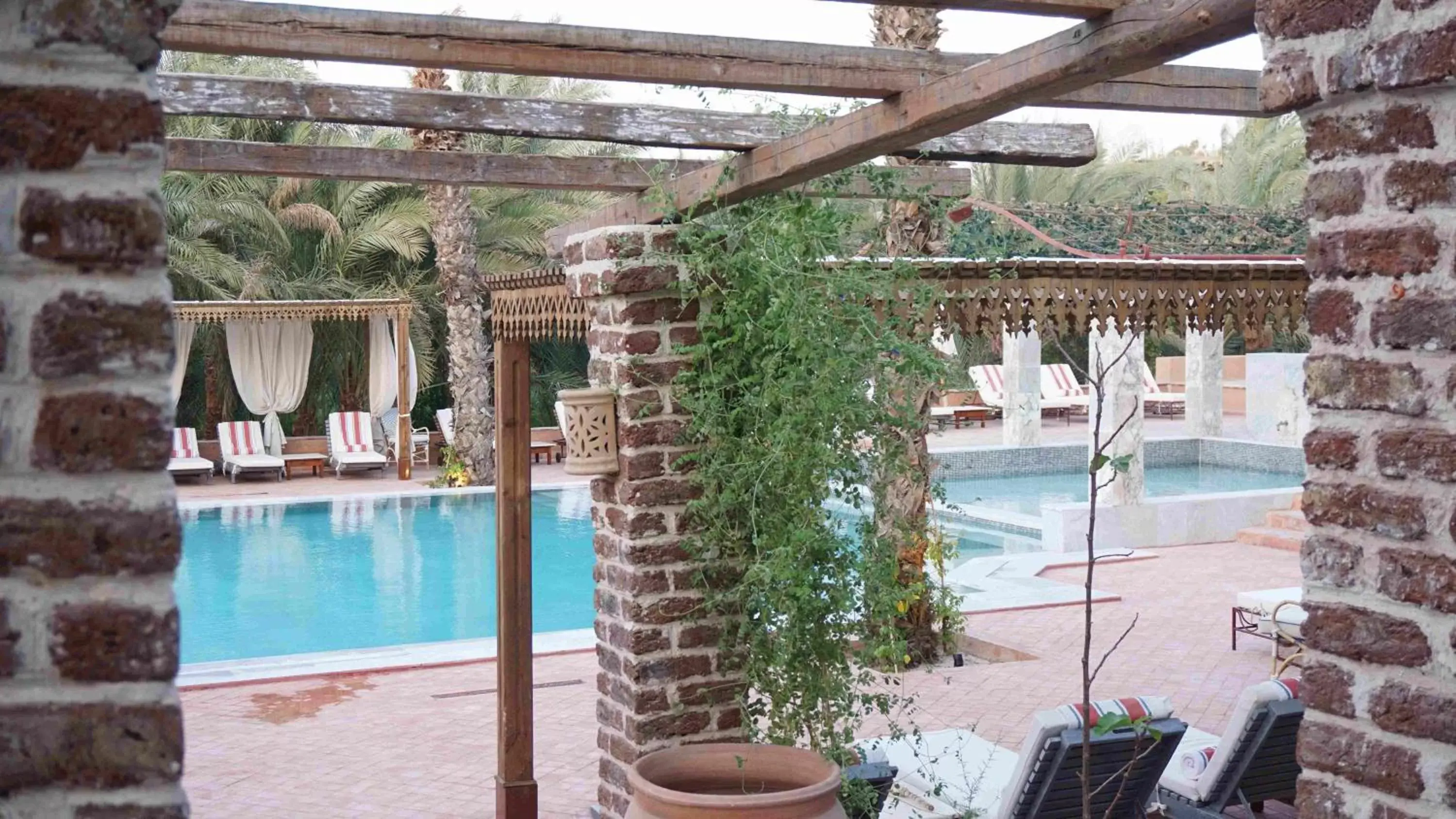 Swimming pool, Pool View in Al Moudira Hotel