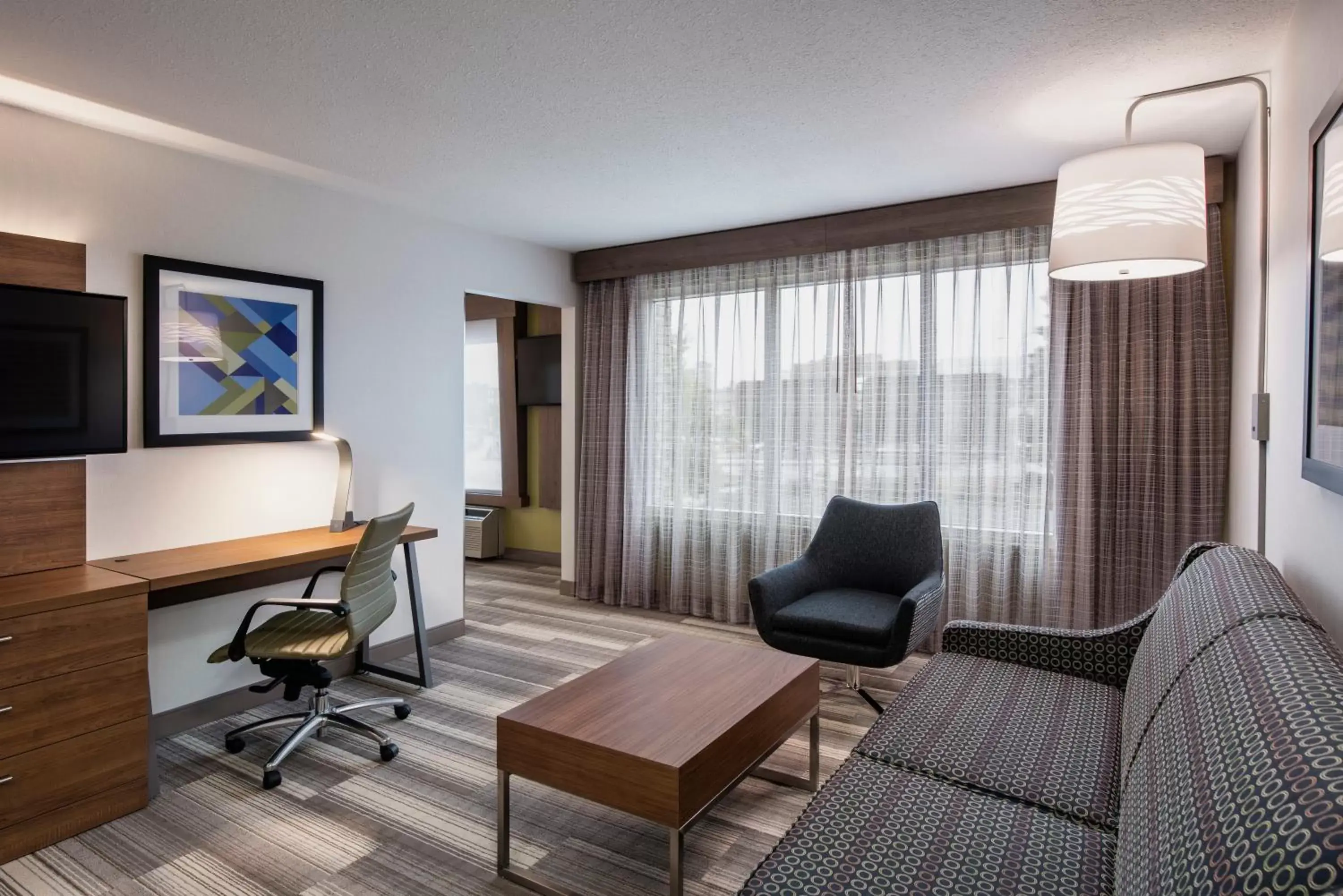 Seating Area in Holiday Inn Express Hotel & Suites Saskatoon, an IHG Hotel