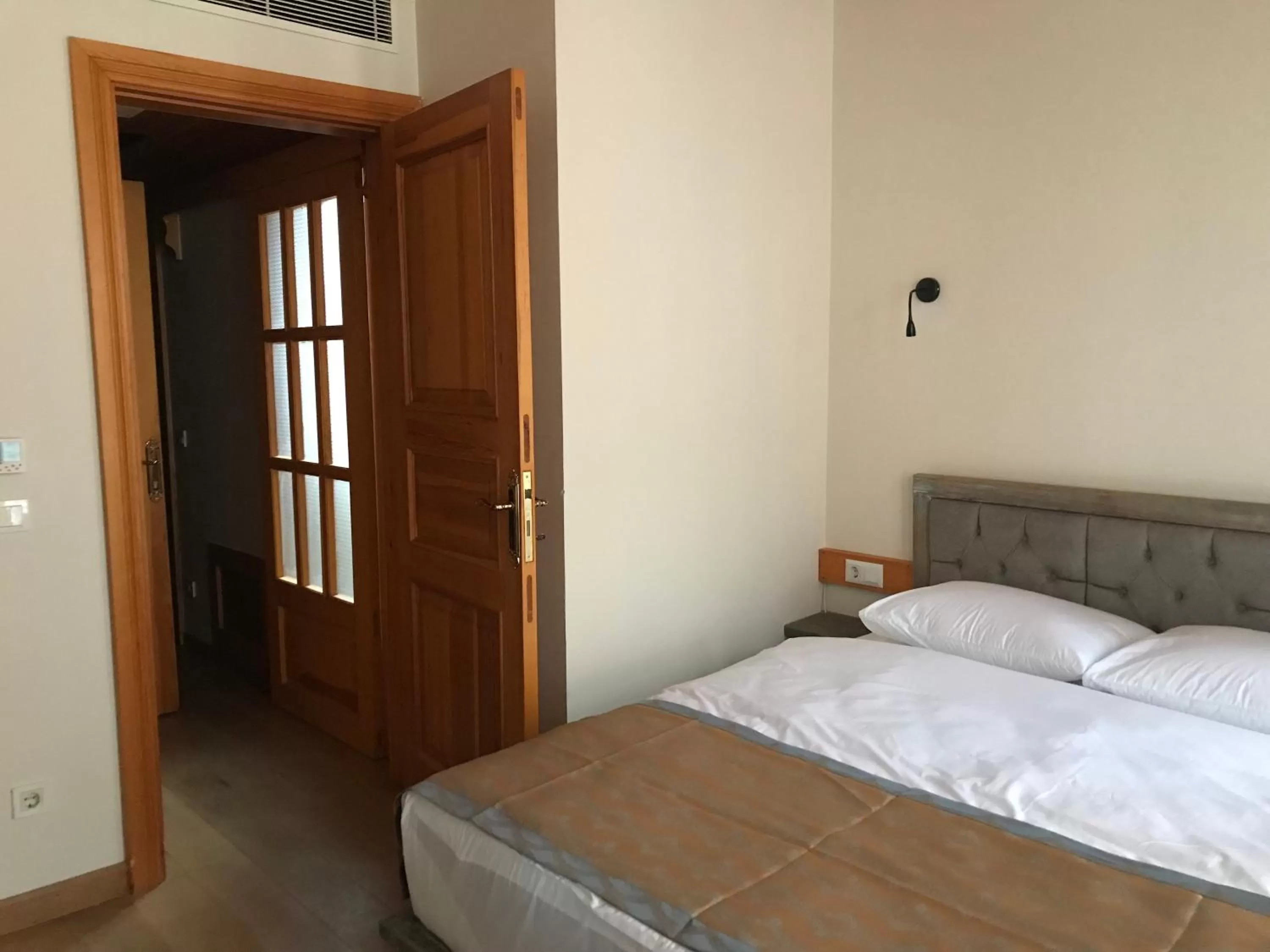 Bed in Green Mansion