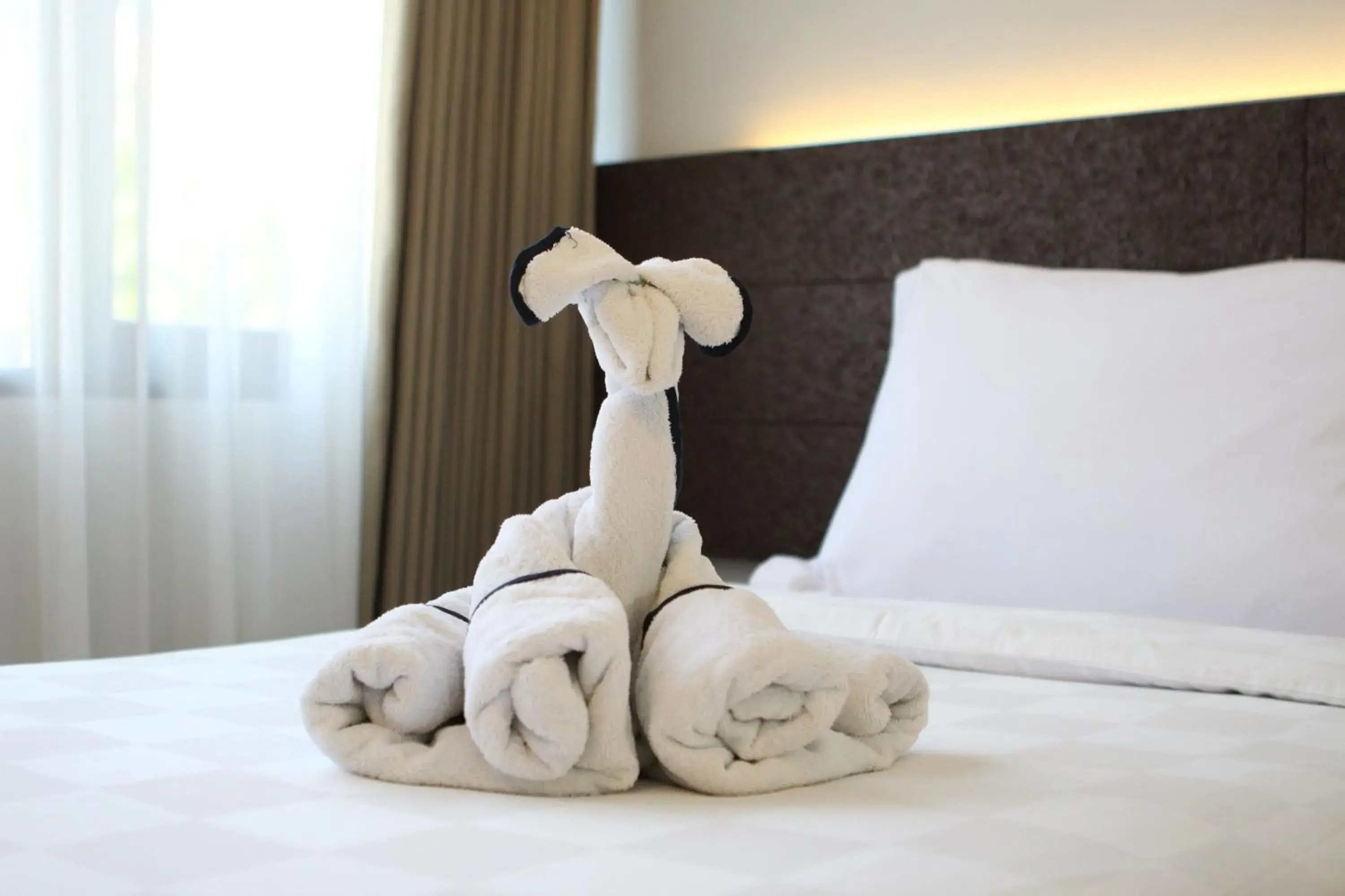 Decorative detail, Bed in Prime Plaza Suites Sanur – Bali