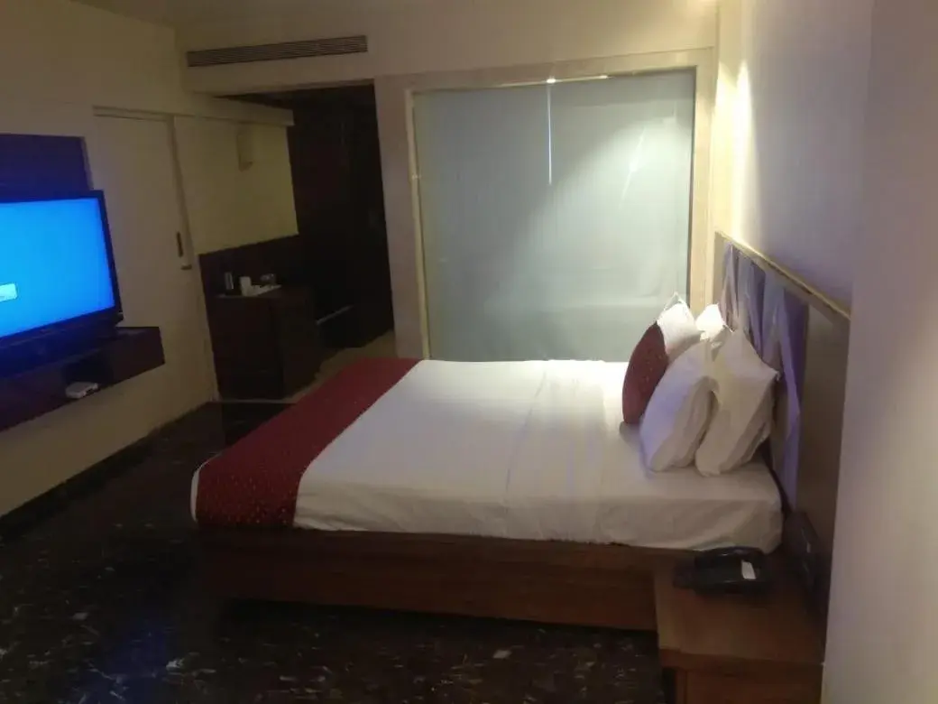 Bed in Quality Inn Regency, Nashik