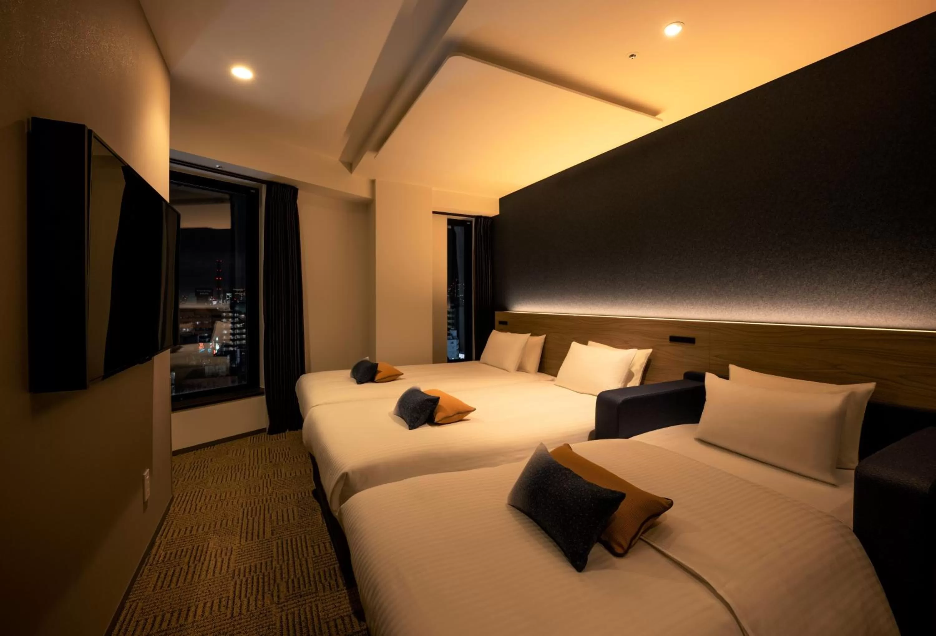 Photo of the whole room, Bed in HOTEL AMANEK Shinjuku Kabukicho