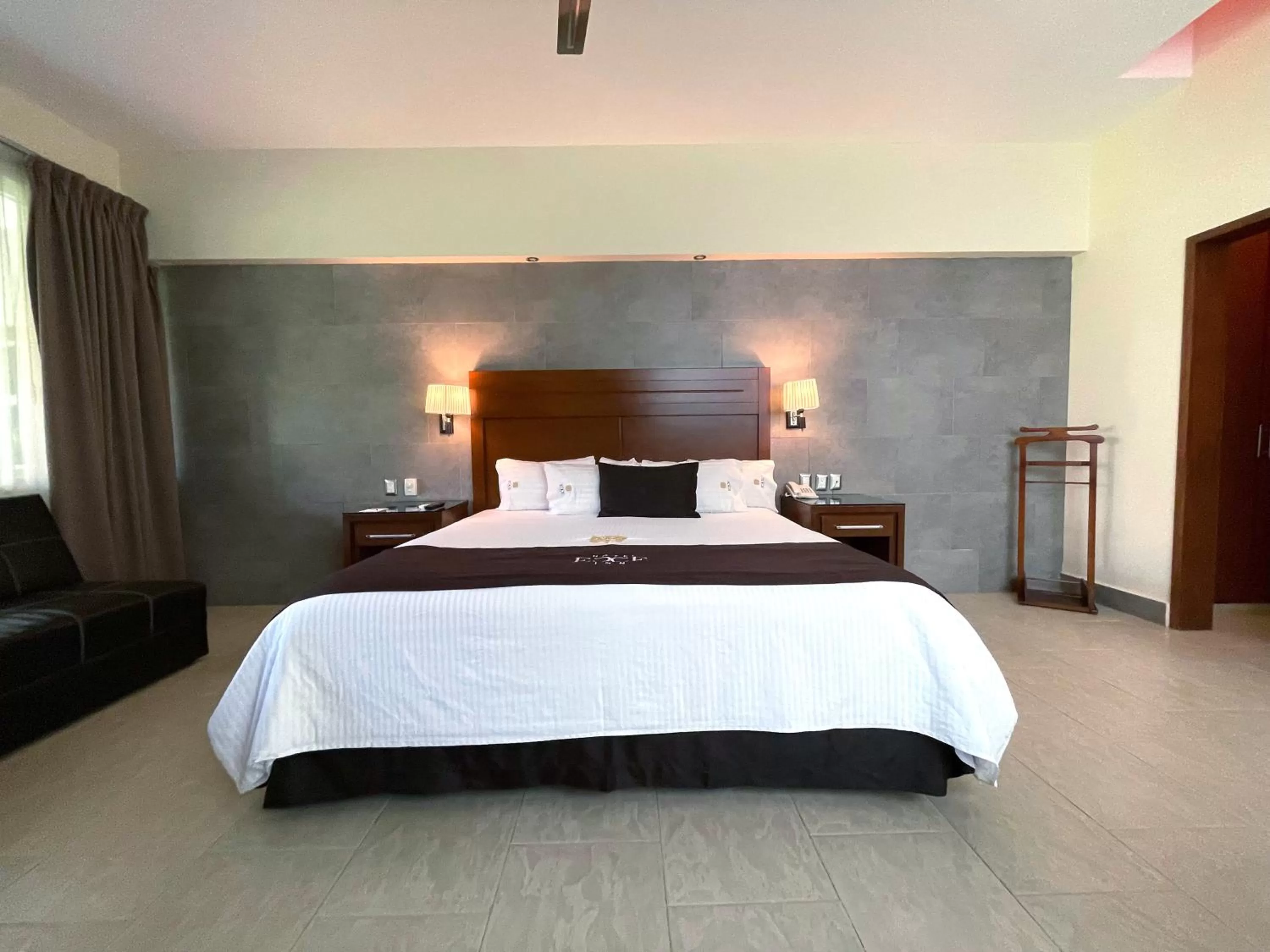 Bed in Hotel Ecce Inn & Spa