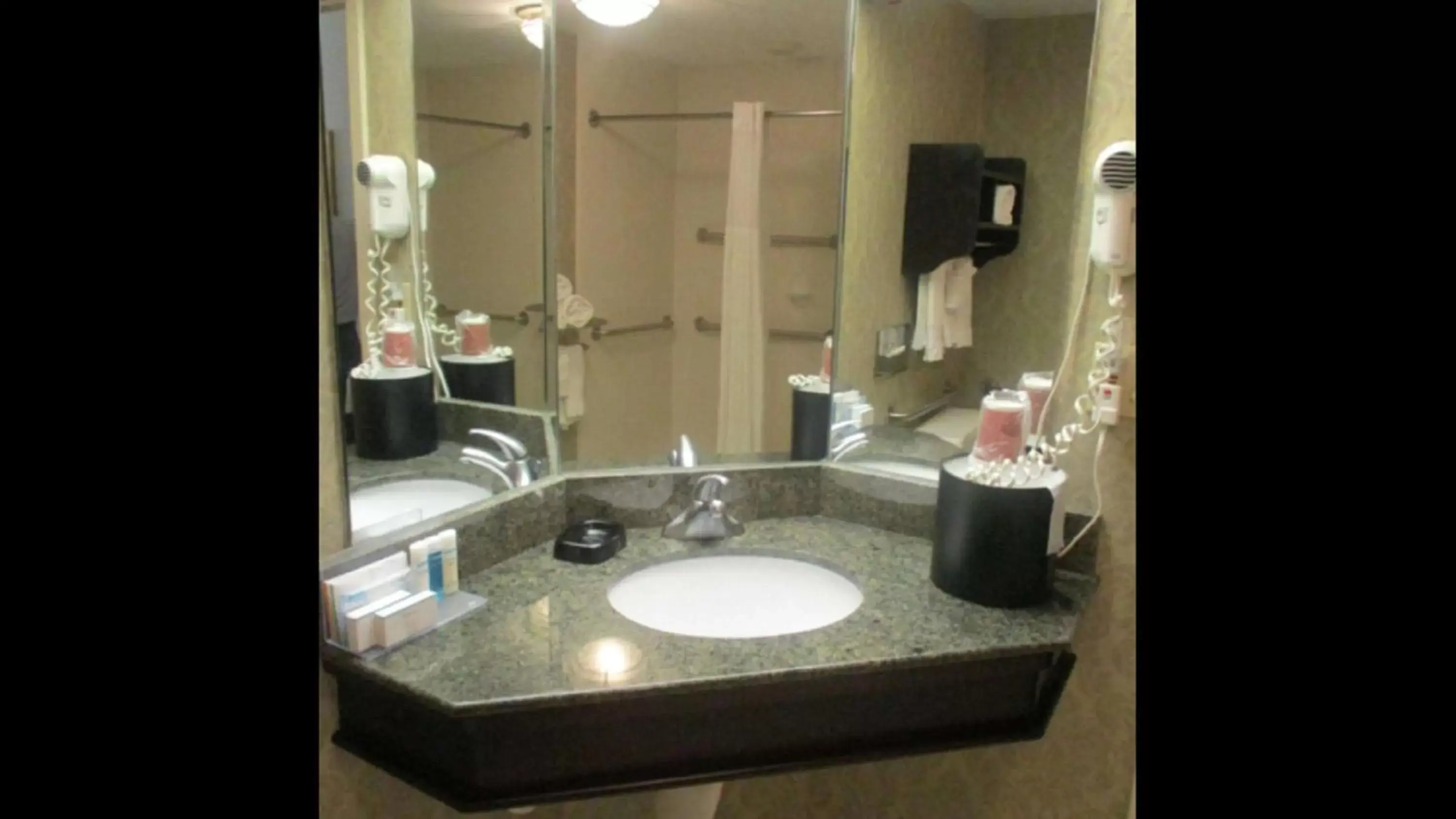 Bathroom in SureStay Plus Hotel by Best Western Norman