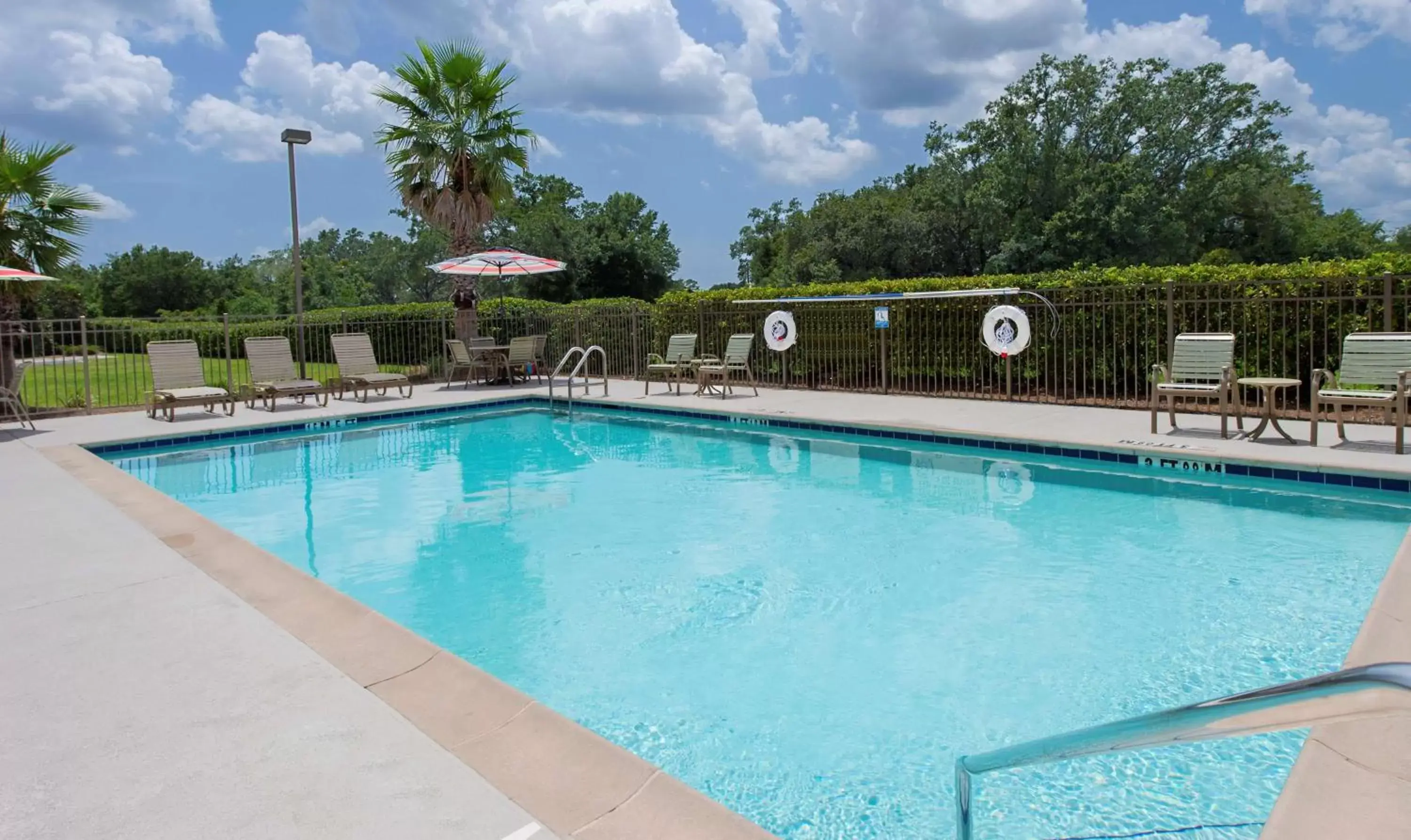 Pool view, Swimming Pool in Hampton Inn & Suites Pensacola I-10 N at University Town Plaza