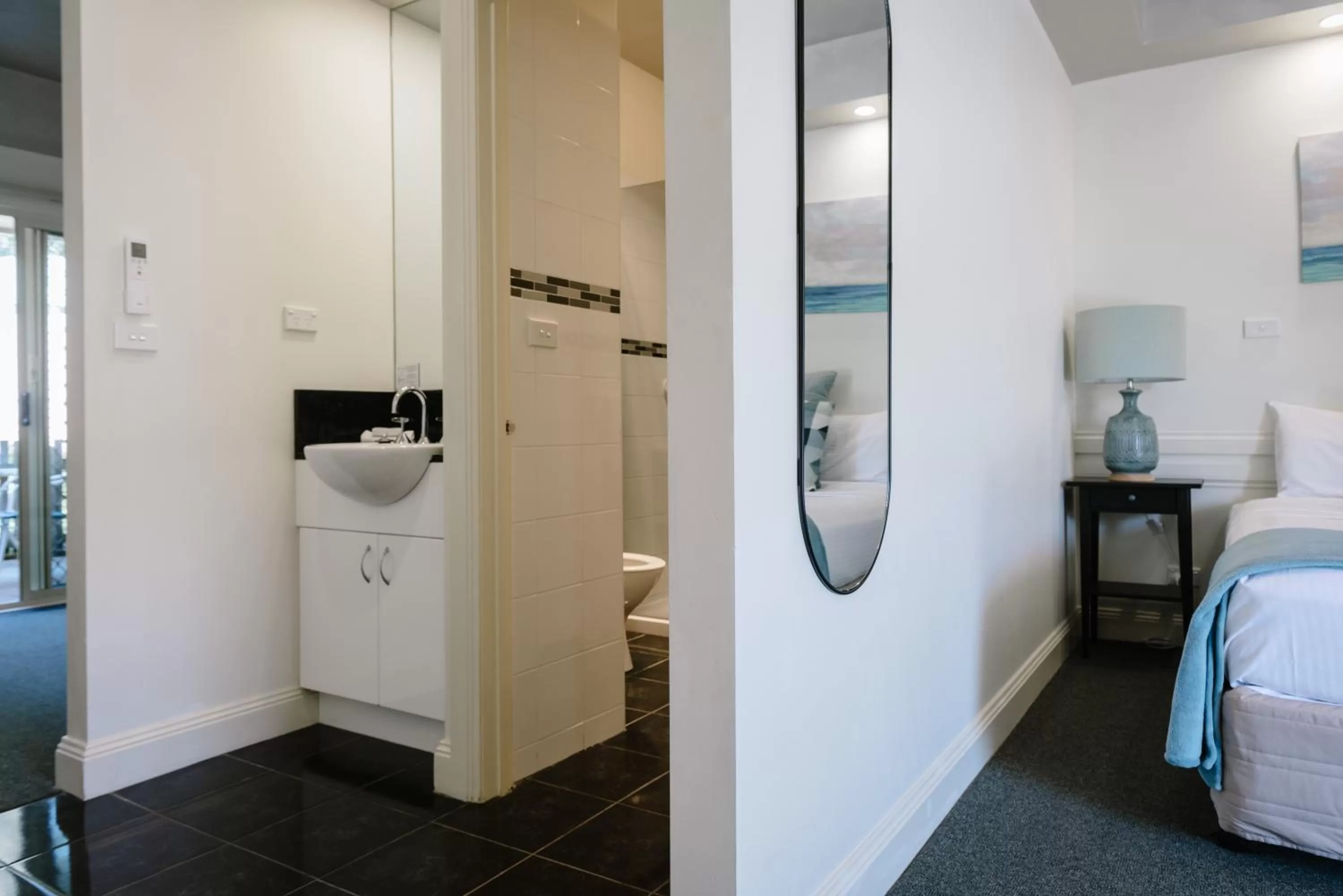 Bathroom, Bed in Fairways Resort