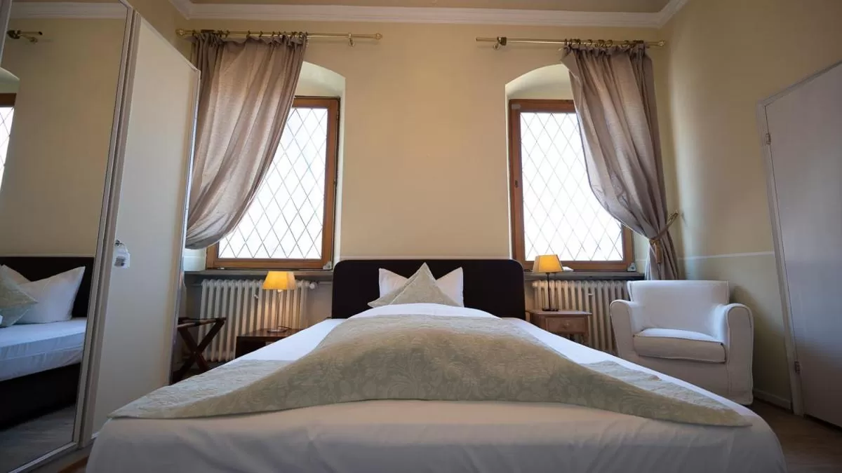 Bed in Boutiquehotel Kloster Pfalzel