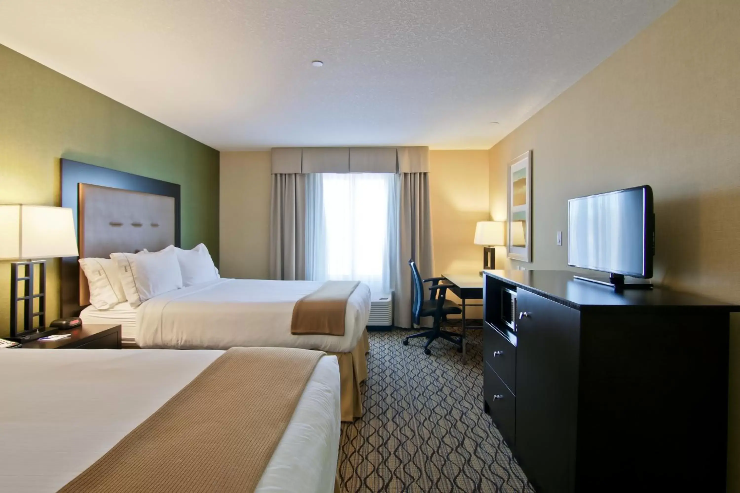 Photo of the whole room, TV/Entertainment Center in Holiday Inn Express Fort Saskatchewan, an IHG Hotel