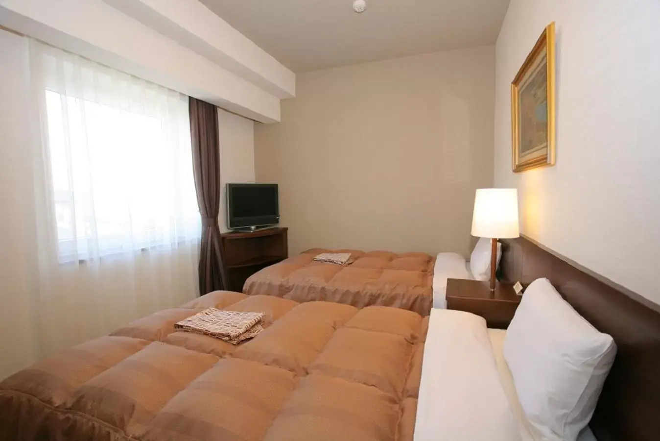 Bed in Hotel Route-inn Koriyama Inter