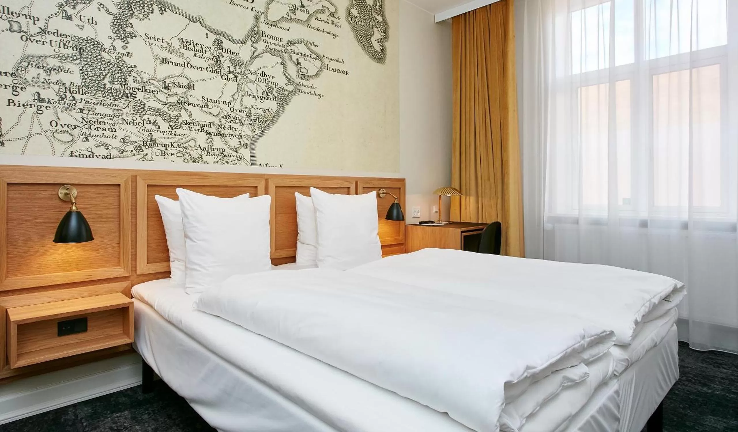 Bed in Jørgensens Hotel