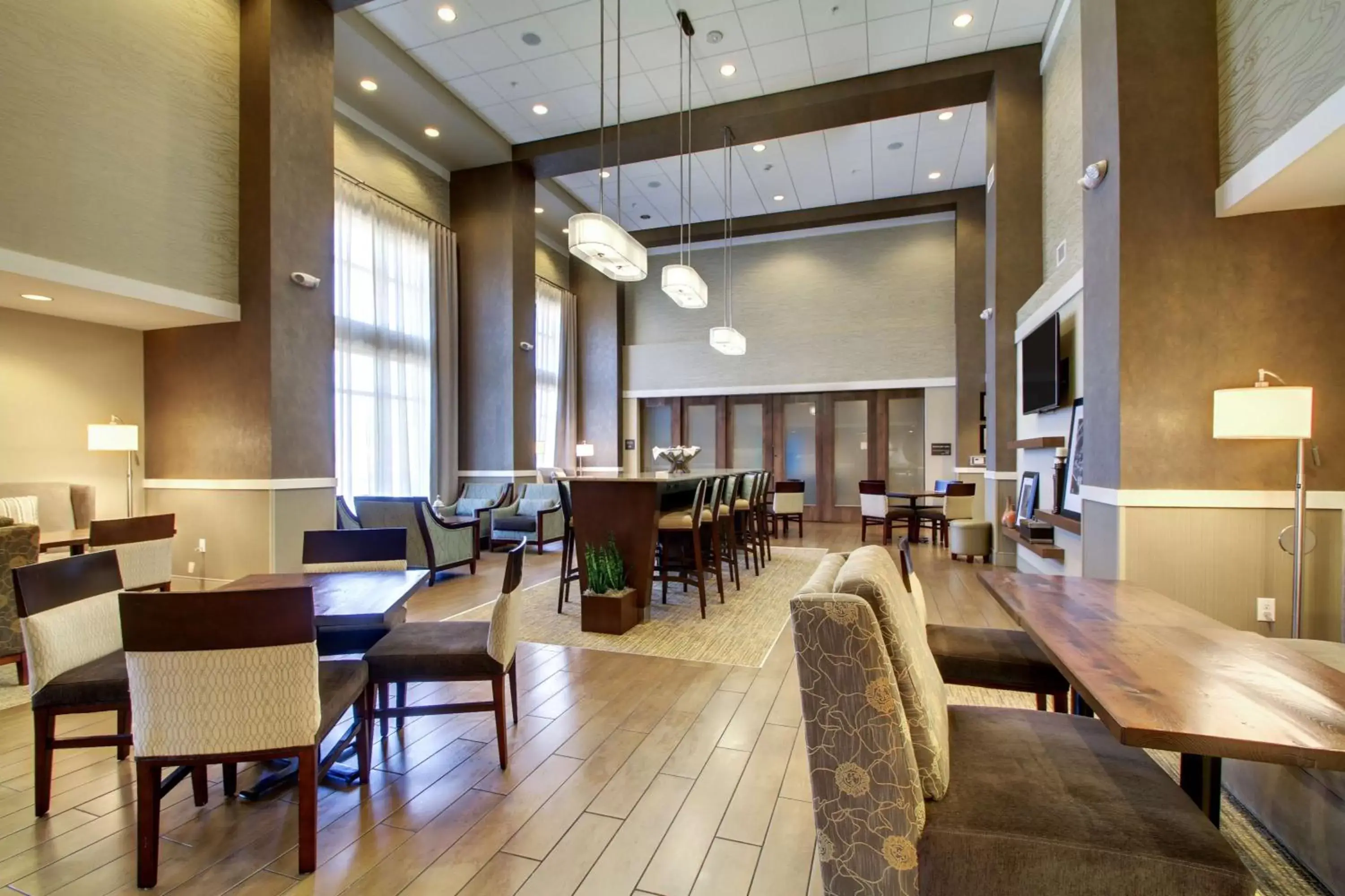 Lobby or reception in Hampton Inn & Suites Milwaukee West Lobby or reception in Hampton Inn & Suites Milwaukee West