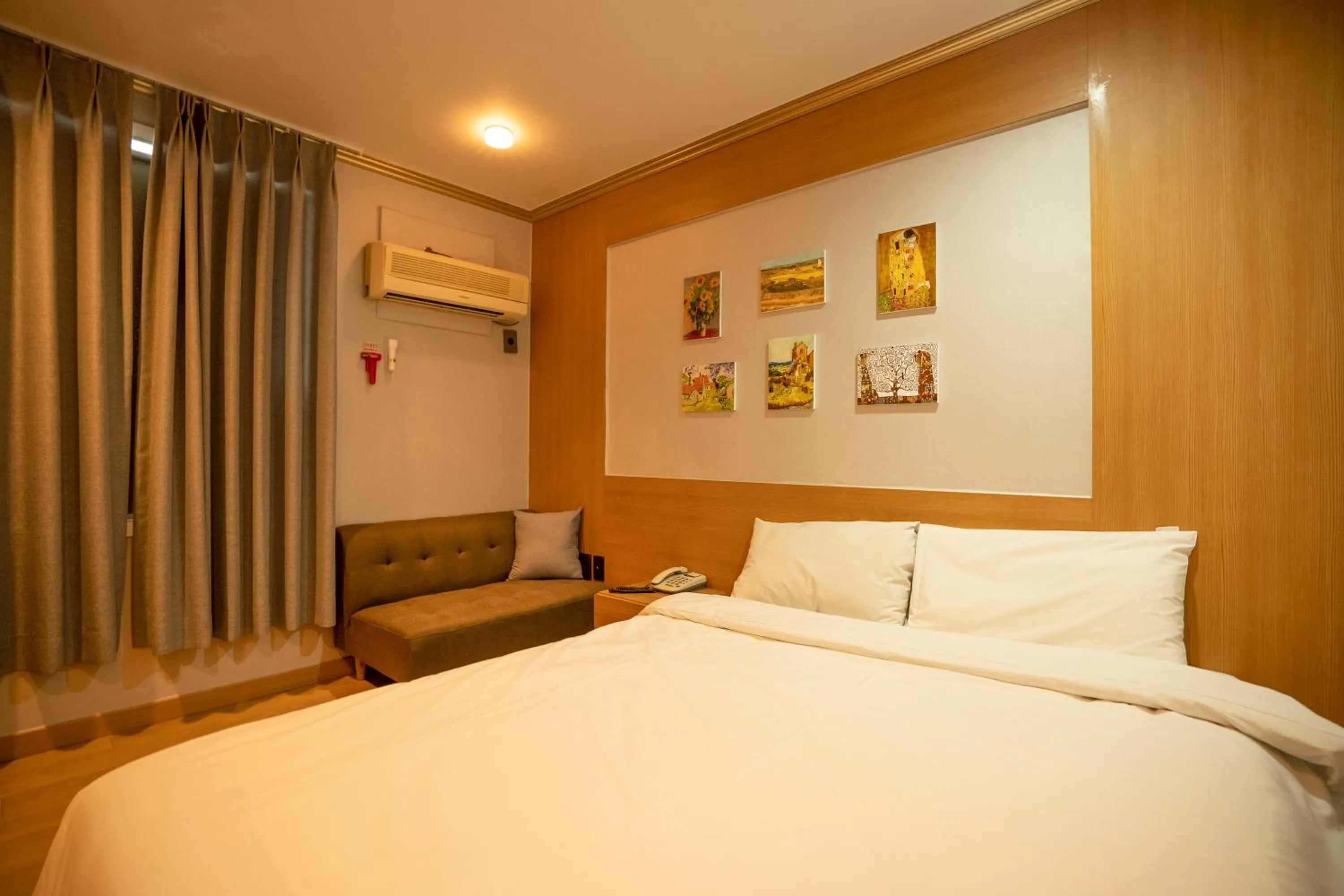 Bed in Jeju Stay Hotel
