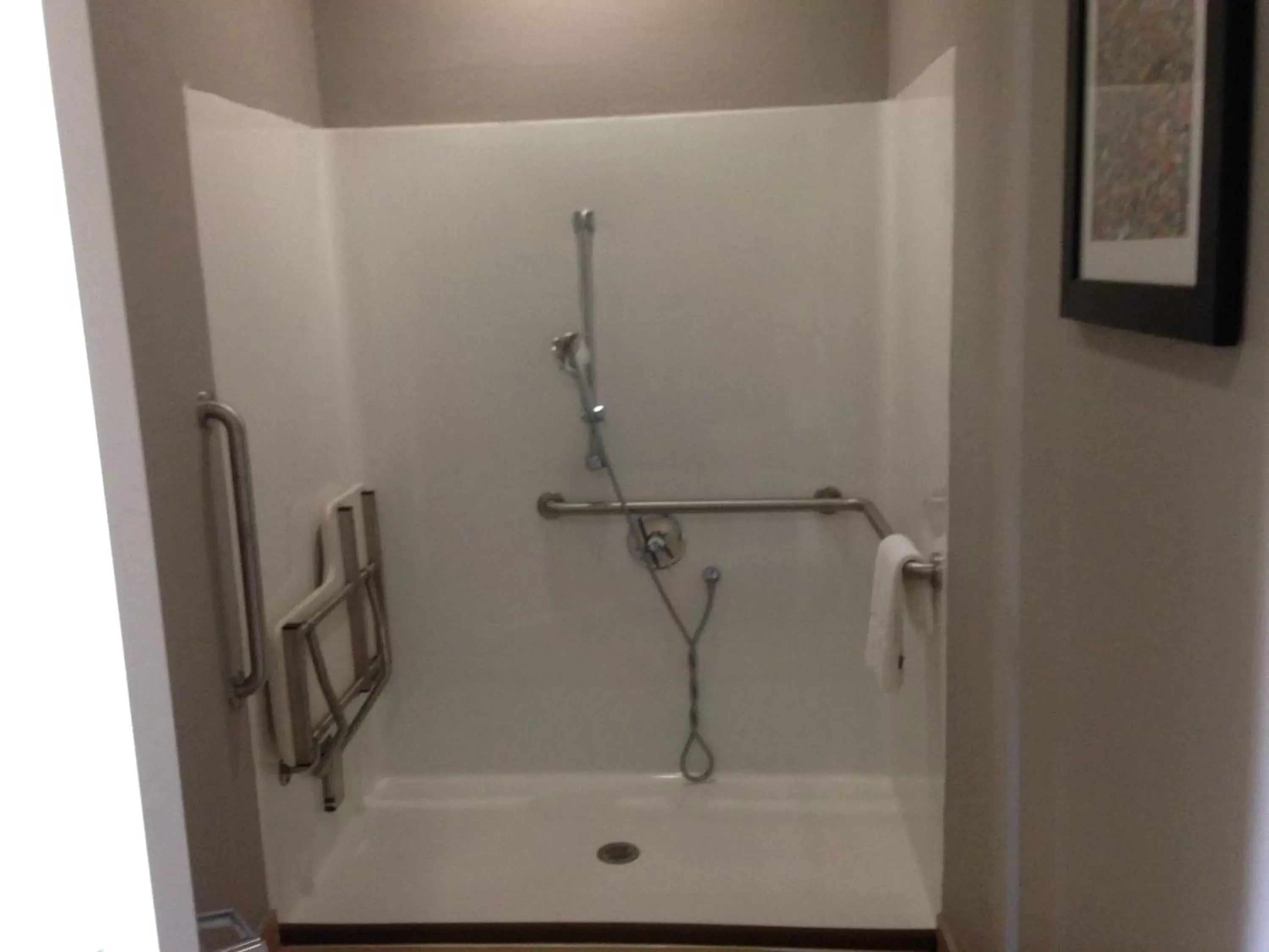 Shower, Bathroom in Scottish Inn & Suites Cotulla, TX