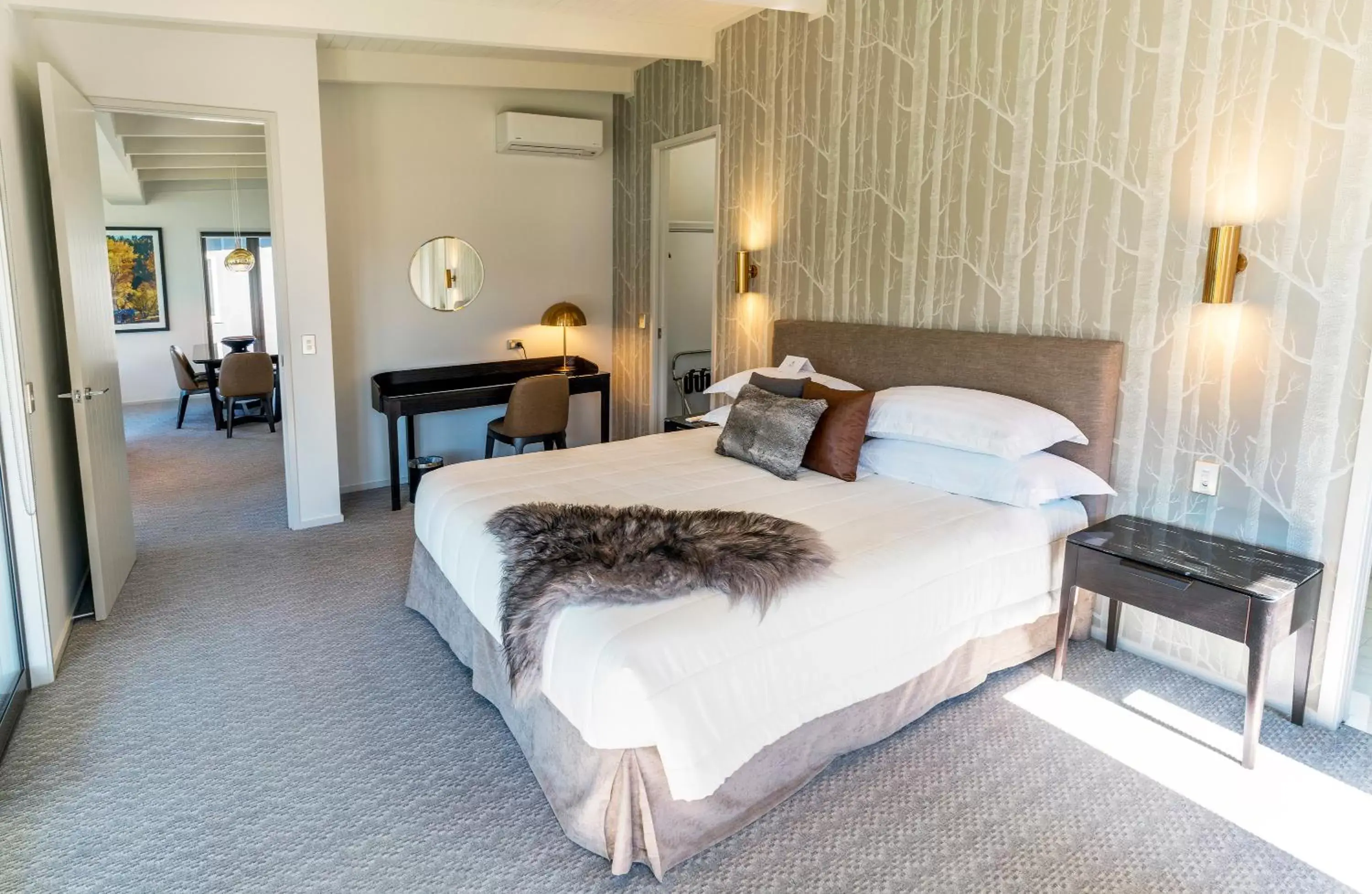 Bed in The Rees Hotel & Luxury Apartments