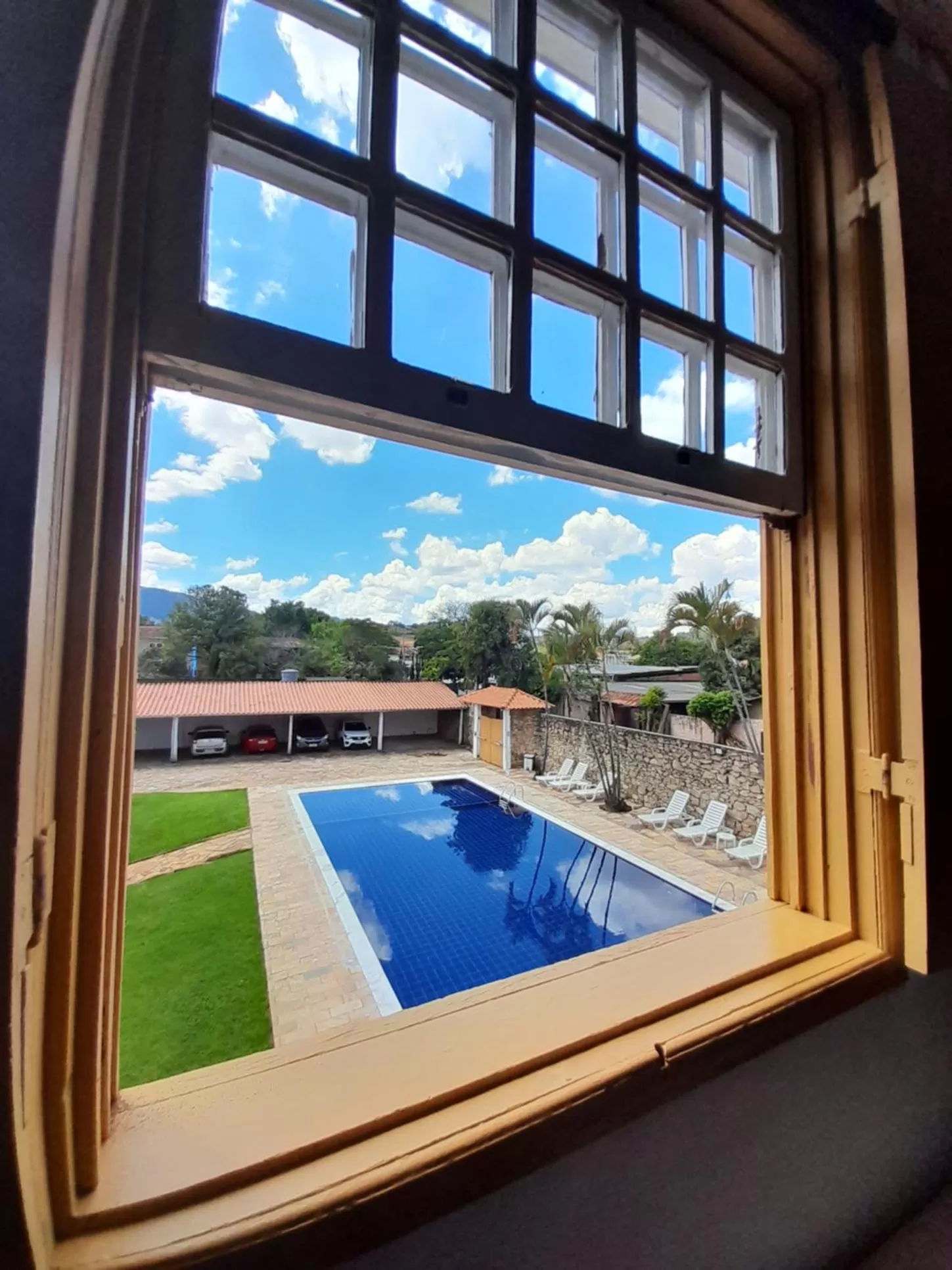 Swimming pool in Pousada o Amanhecer