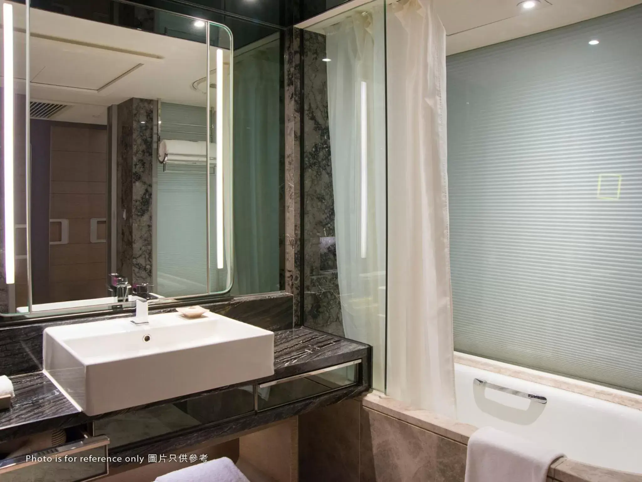 Bathroom in Royal Plaza Hotel