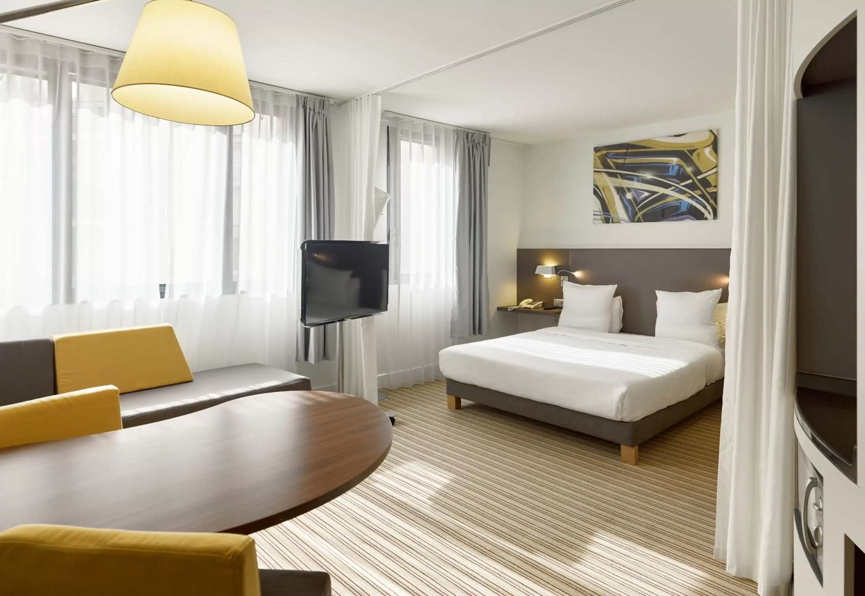 Bedroom in Novotel Suites Paris Rueil Malmaison