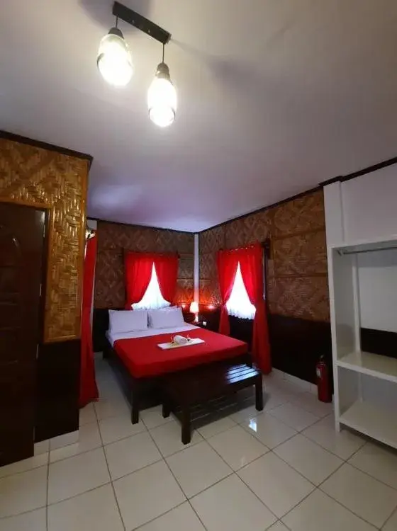 Bed in Hof Gorei Beach Resort Davao