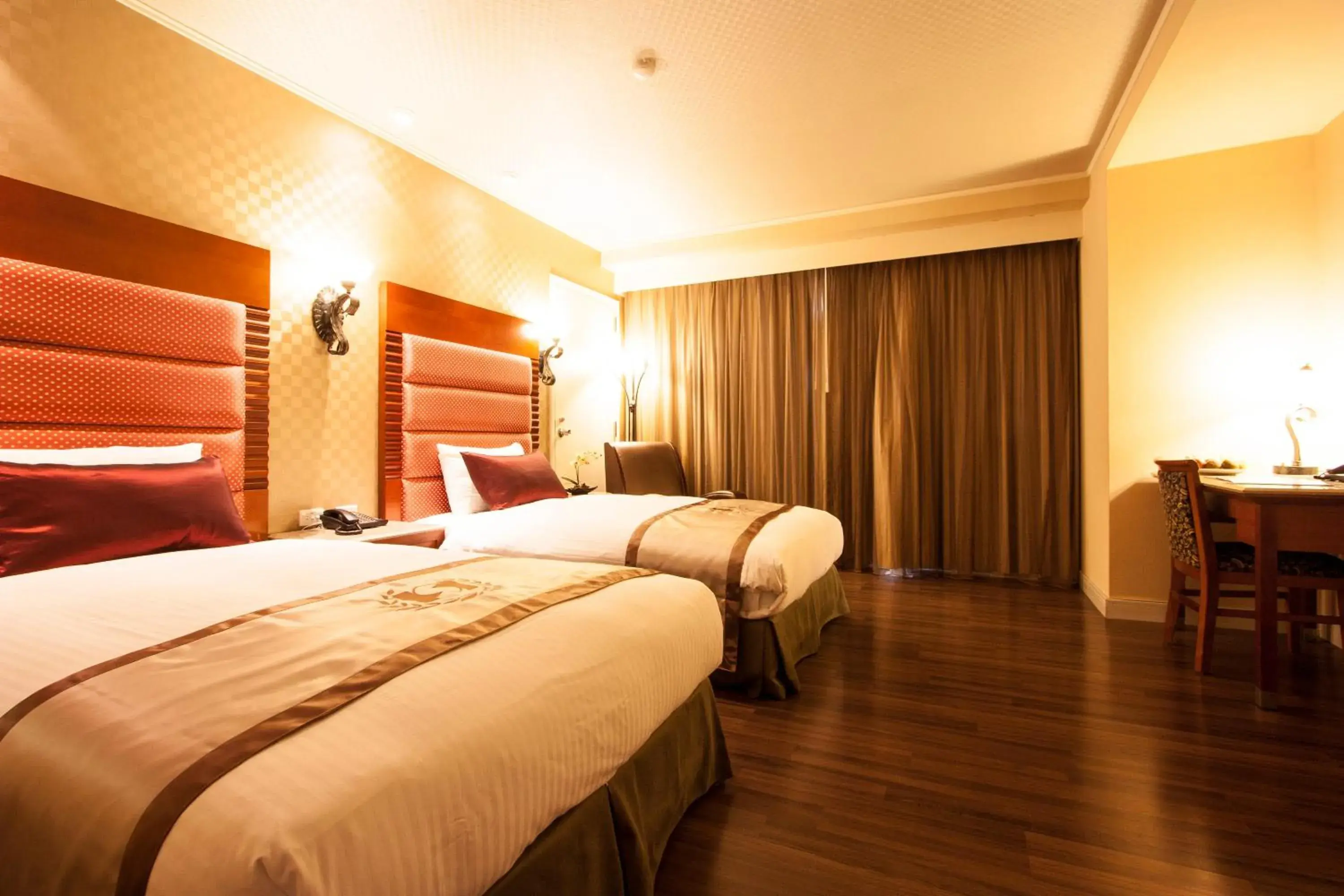 Bed in Charming City Hotel Hualien