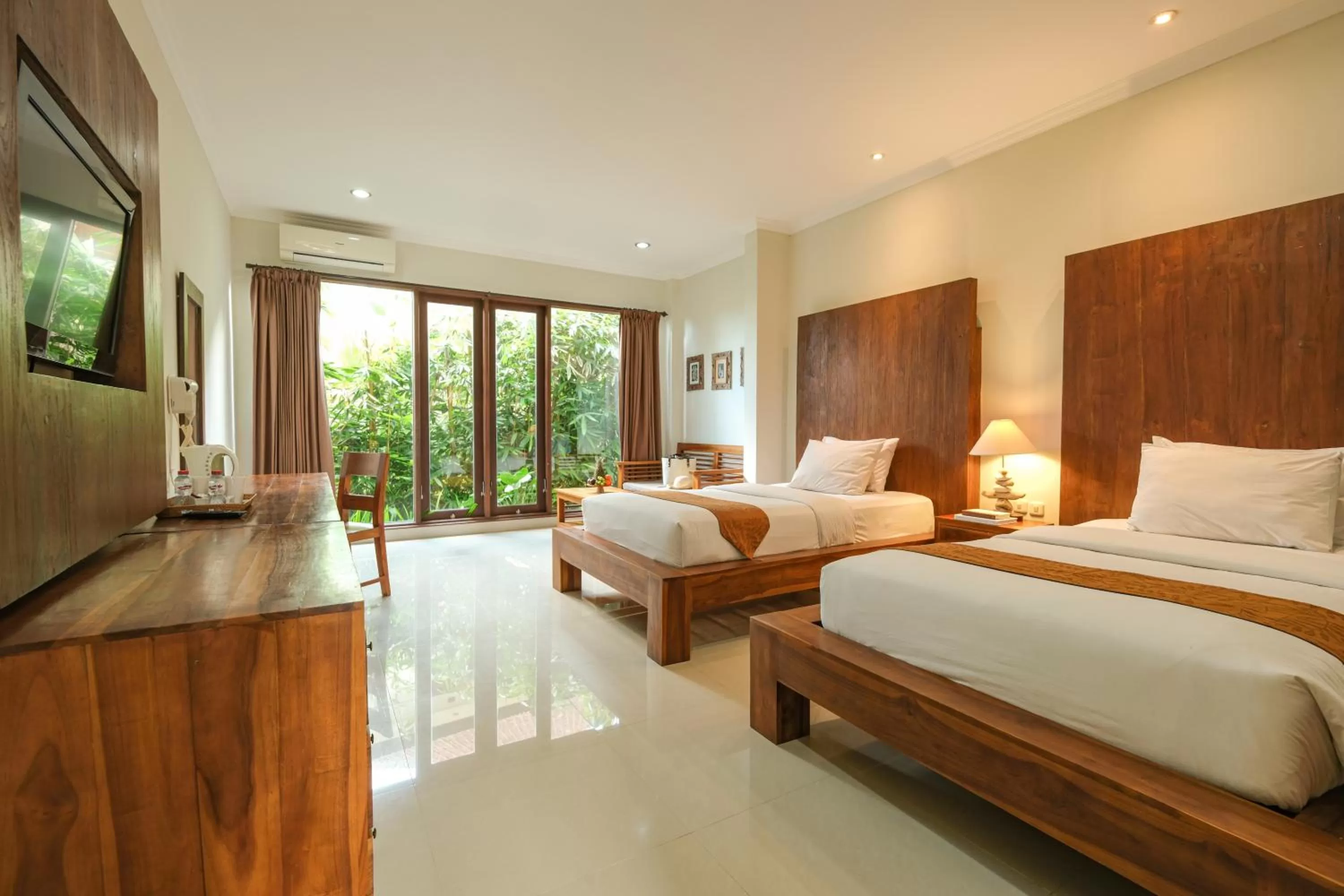 Photo of the whole room, Bed in Artini Bisma Ubud Hotel