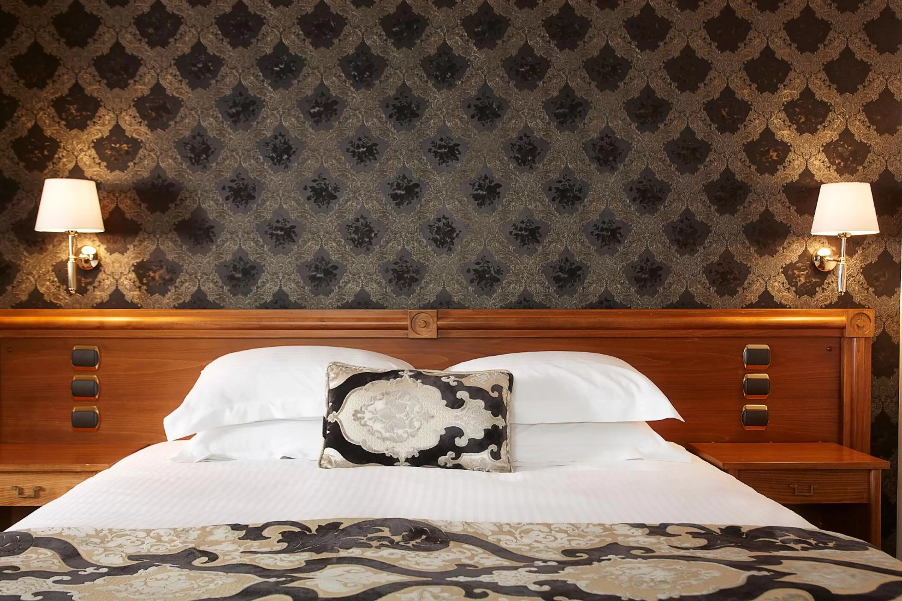 Bed in Ava Hotel and Suites