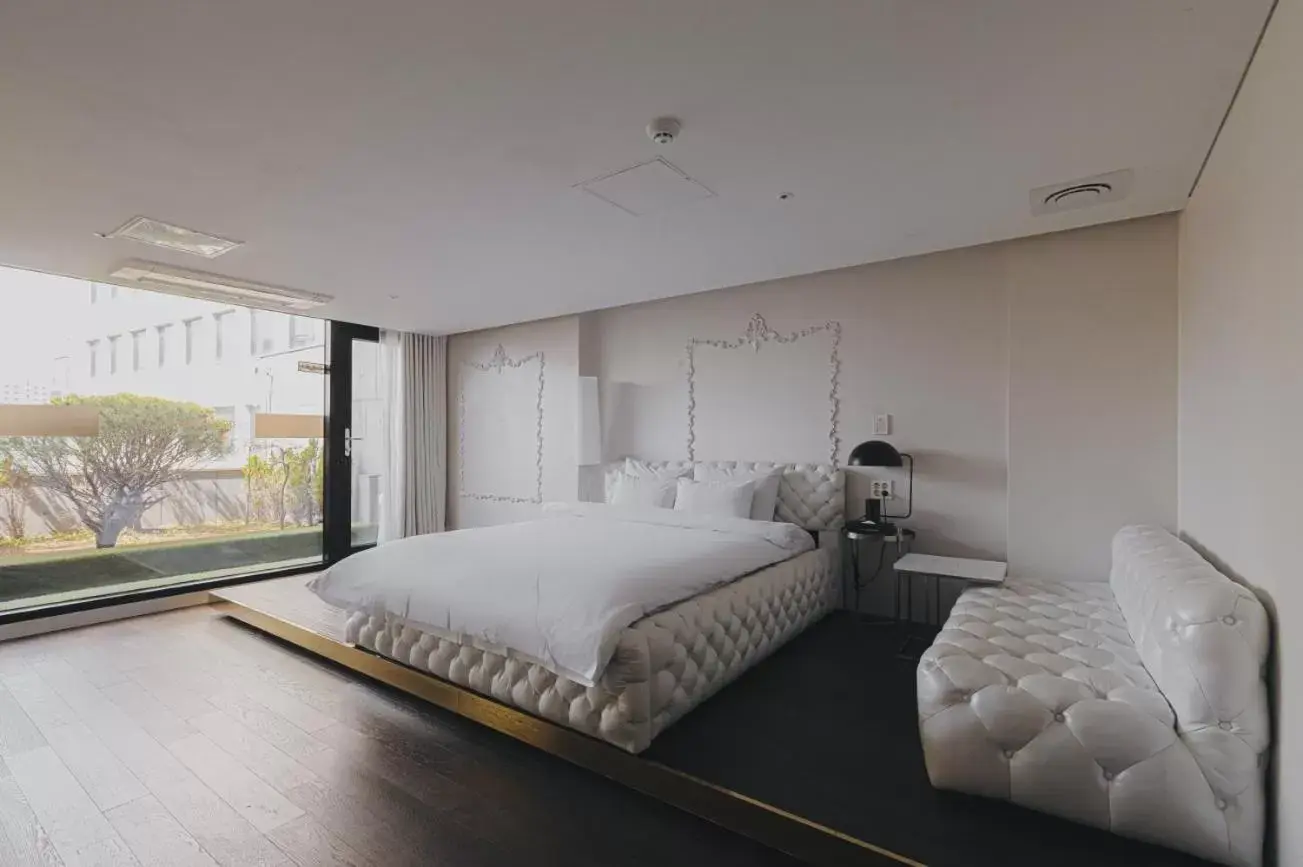 Bed in ACC Design Hotel